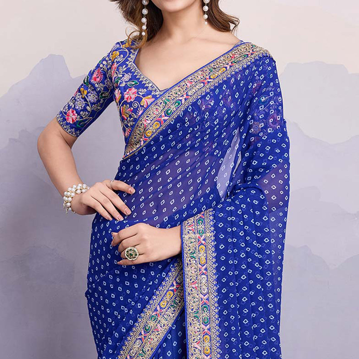 Blue Bandhani Printed Georgette Saree With Embroidered Lace Border