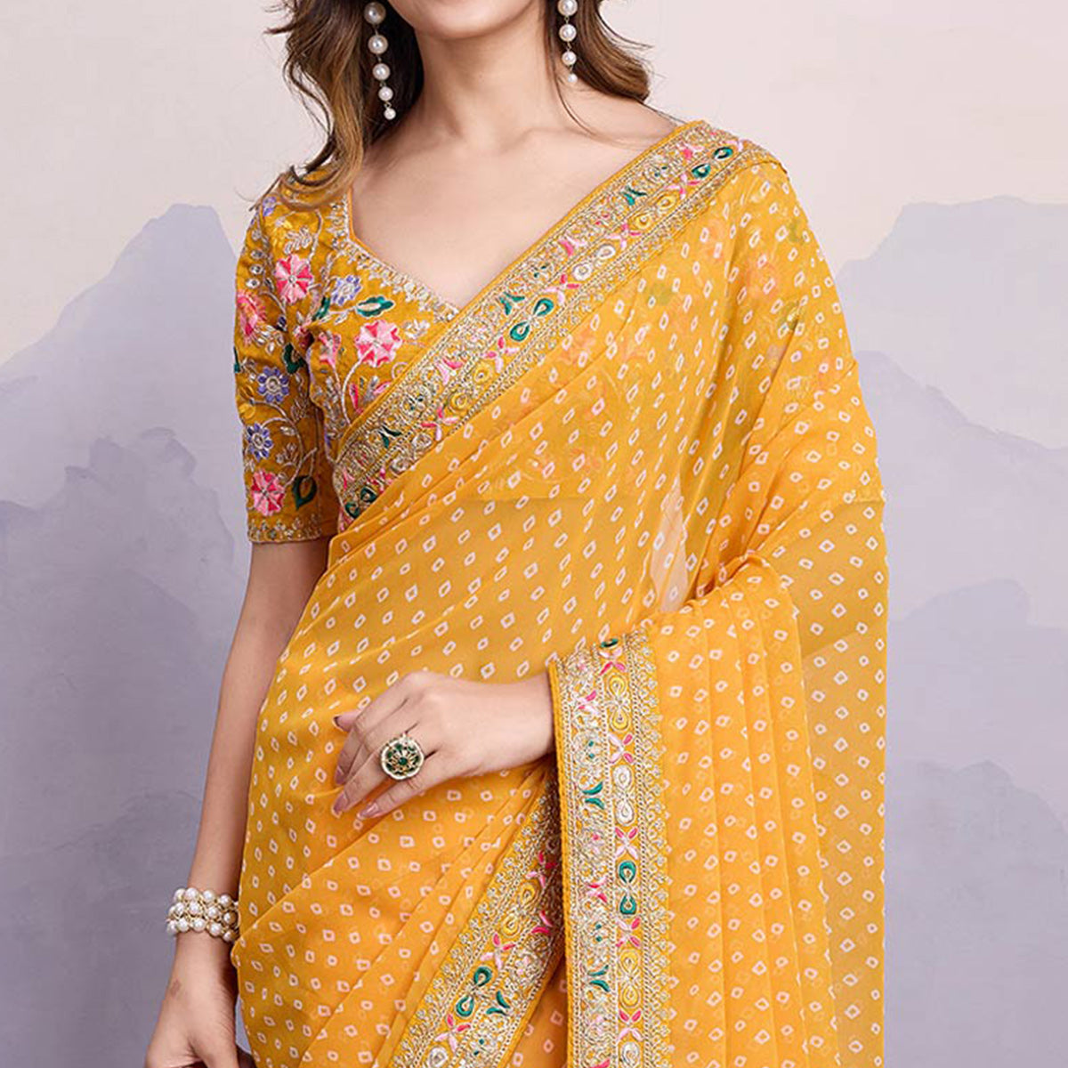 Yellow Bandhani Printed Georgette Saree With Embroidered Lace Border