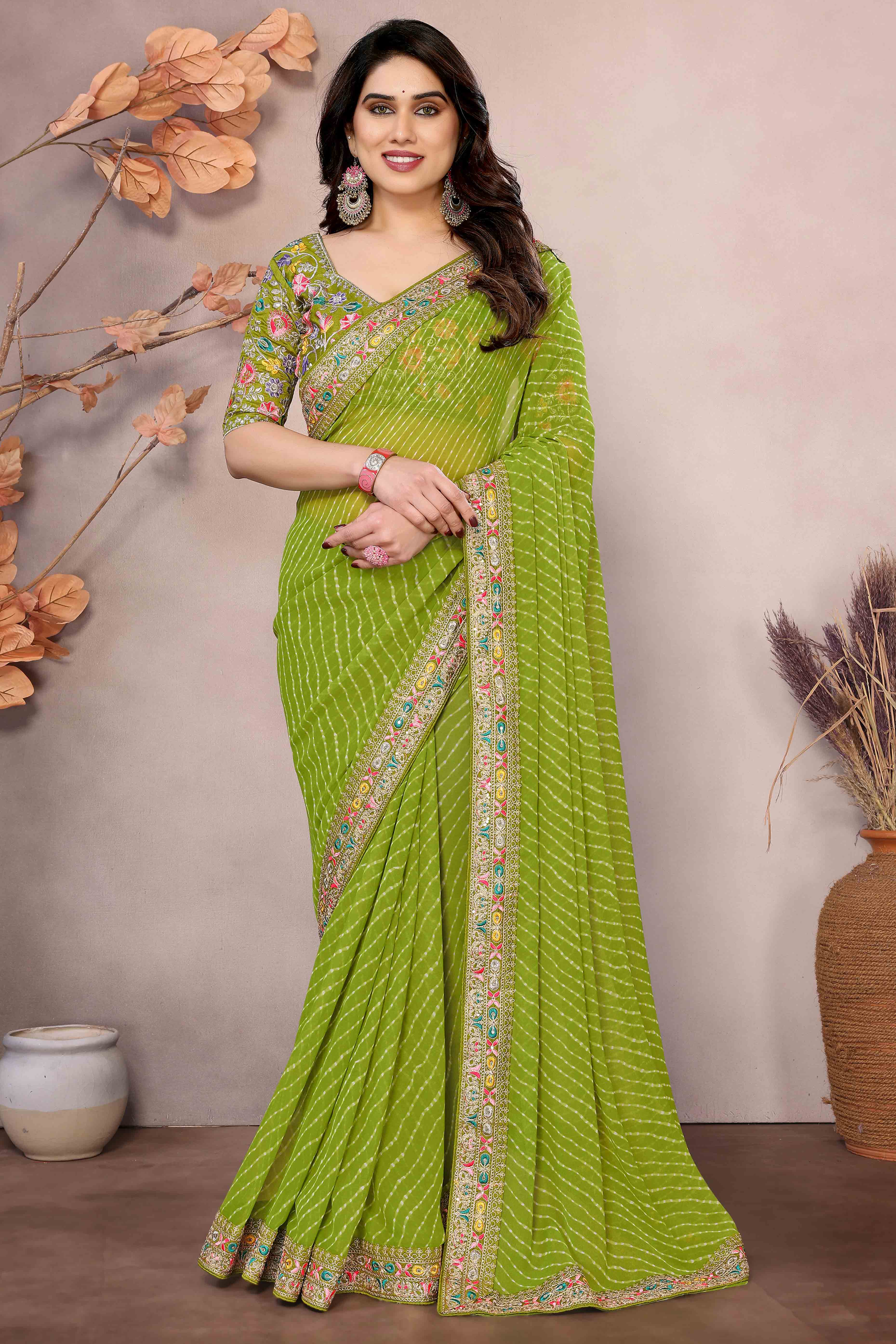 Green Striped Printed Georgette Saree With Glittering Sequin Cording Embroidered Border