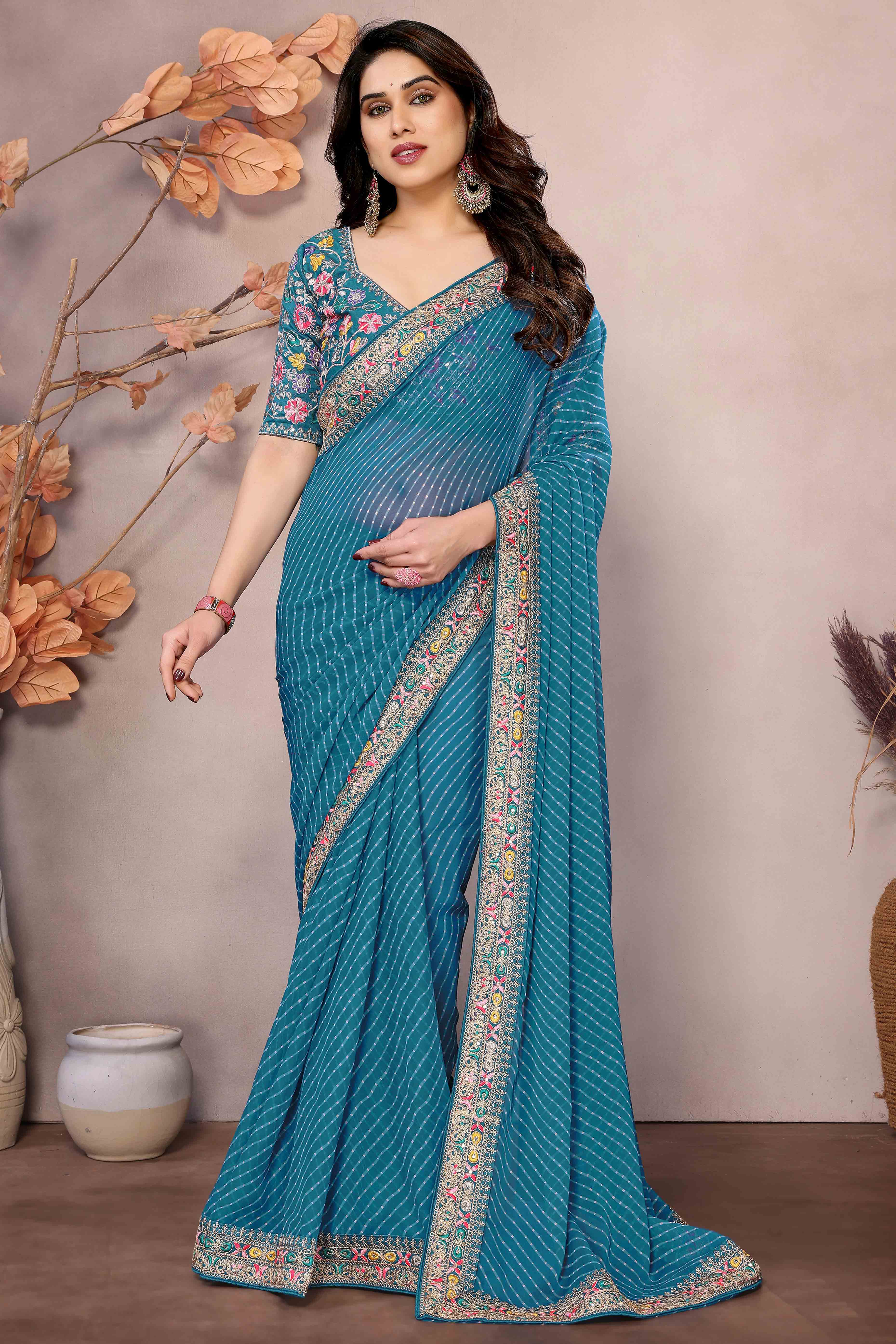 Blue Striped Printed Georgette Saree With Glittering Sequin Cording Embroidered Border
