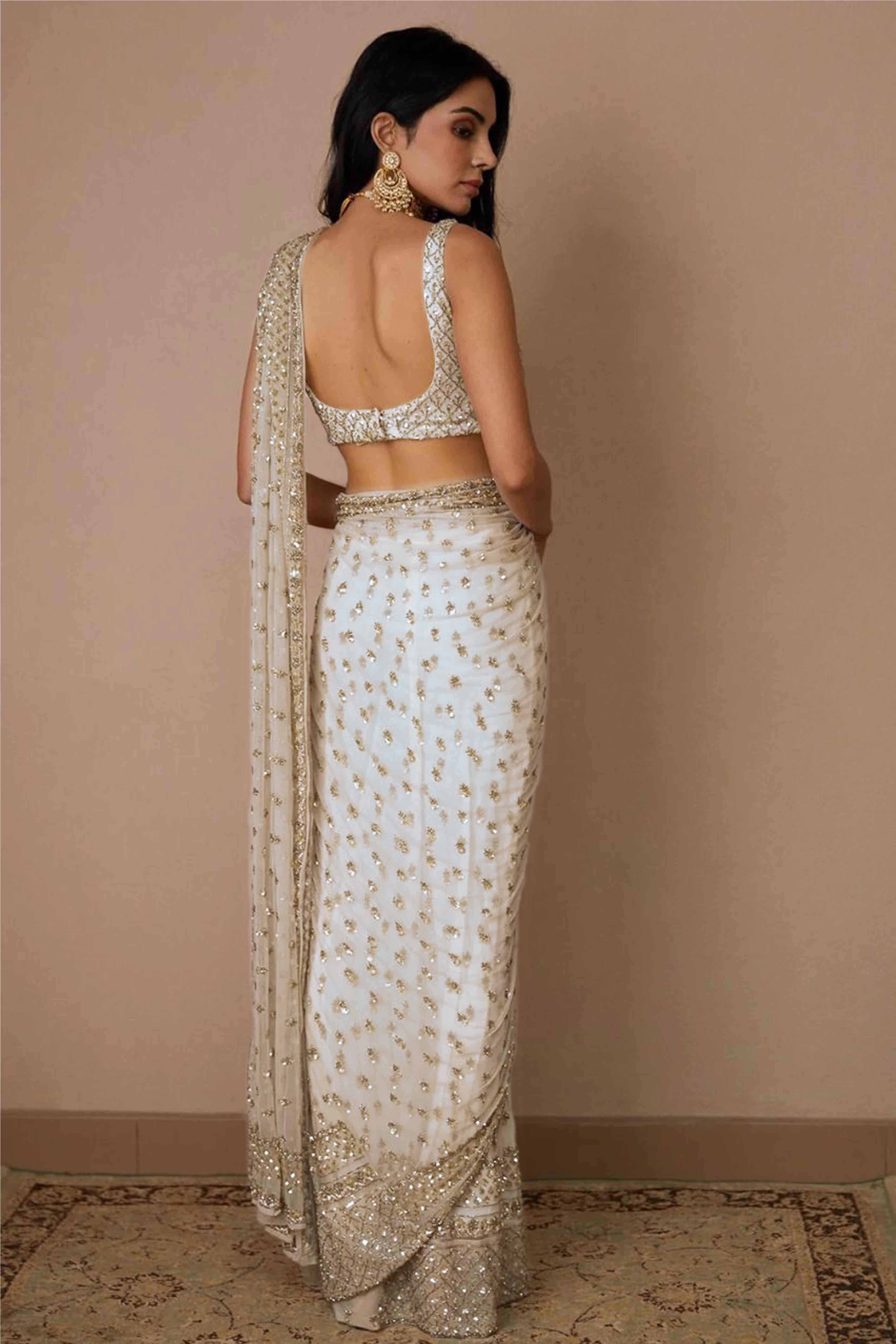 Graceful Off White Sequins Embellished Net Saree for Partywear