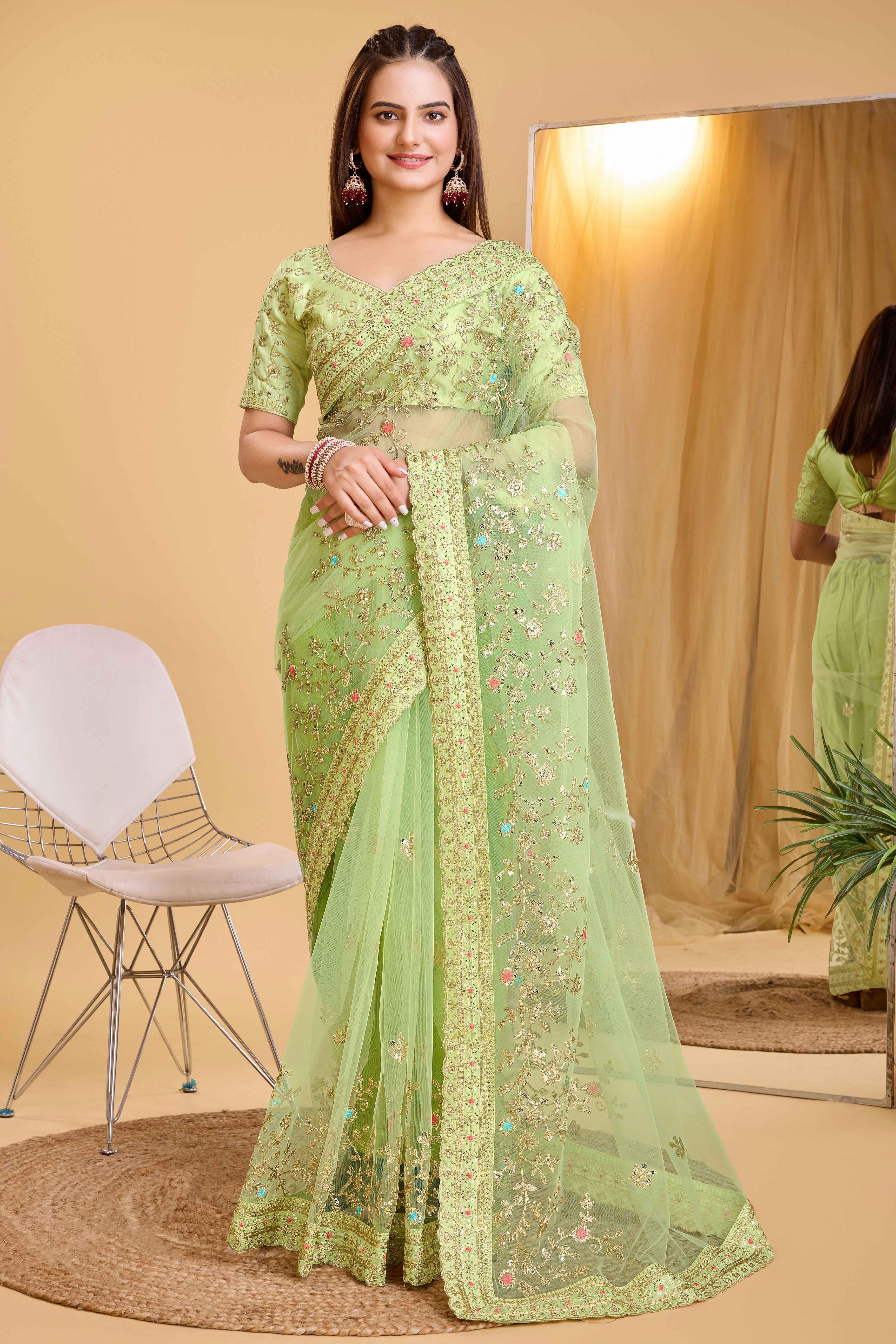 Green Soft Net Saree With Delicate Floral Embroidery & Shimmering Sequins Work