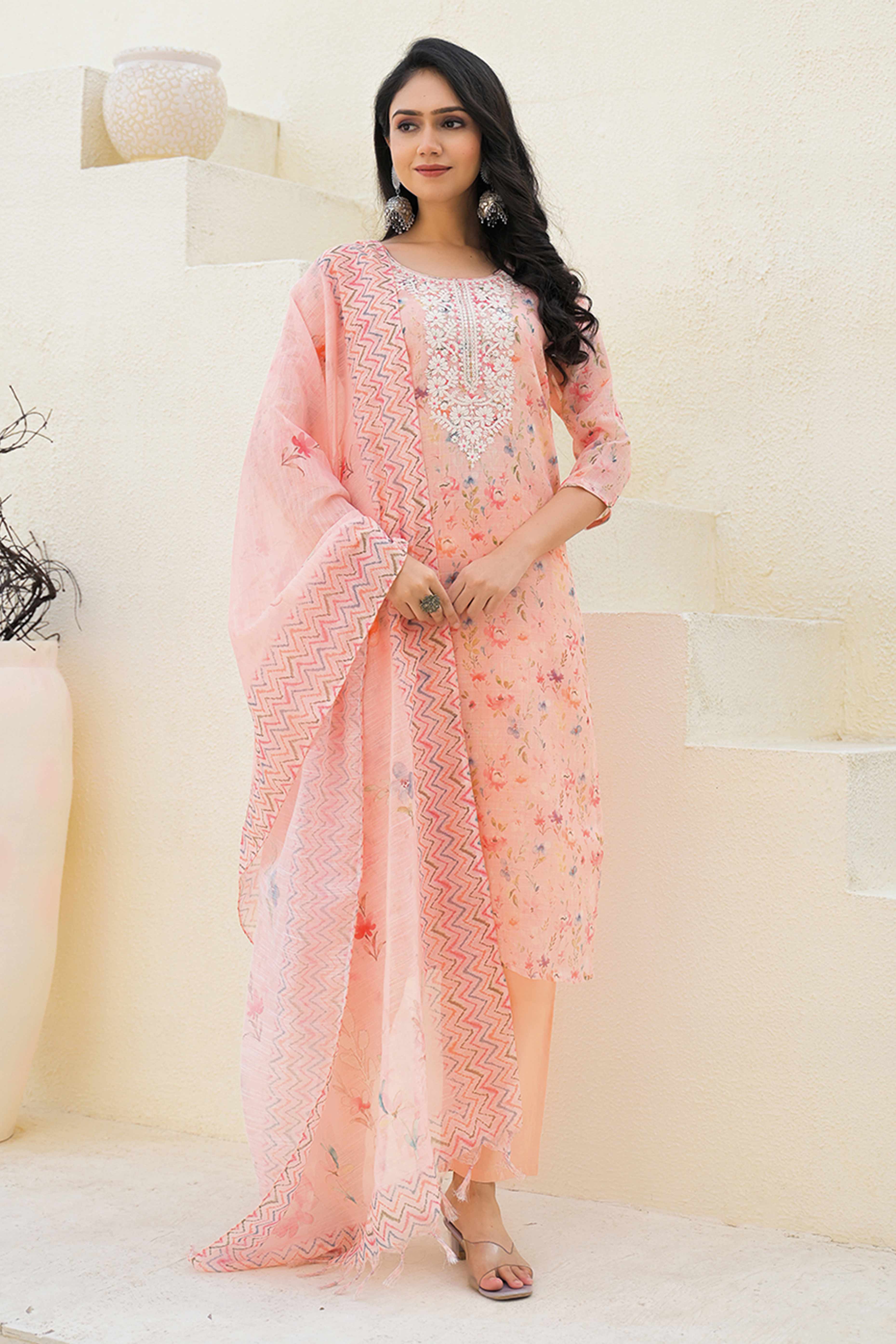 Graceful Peach Floral Printed Suit in Linen with Delicate Chikankari Embroidery