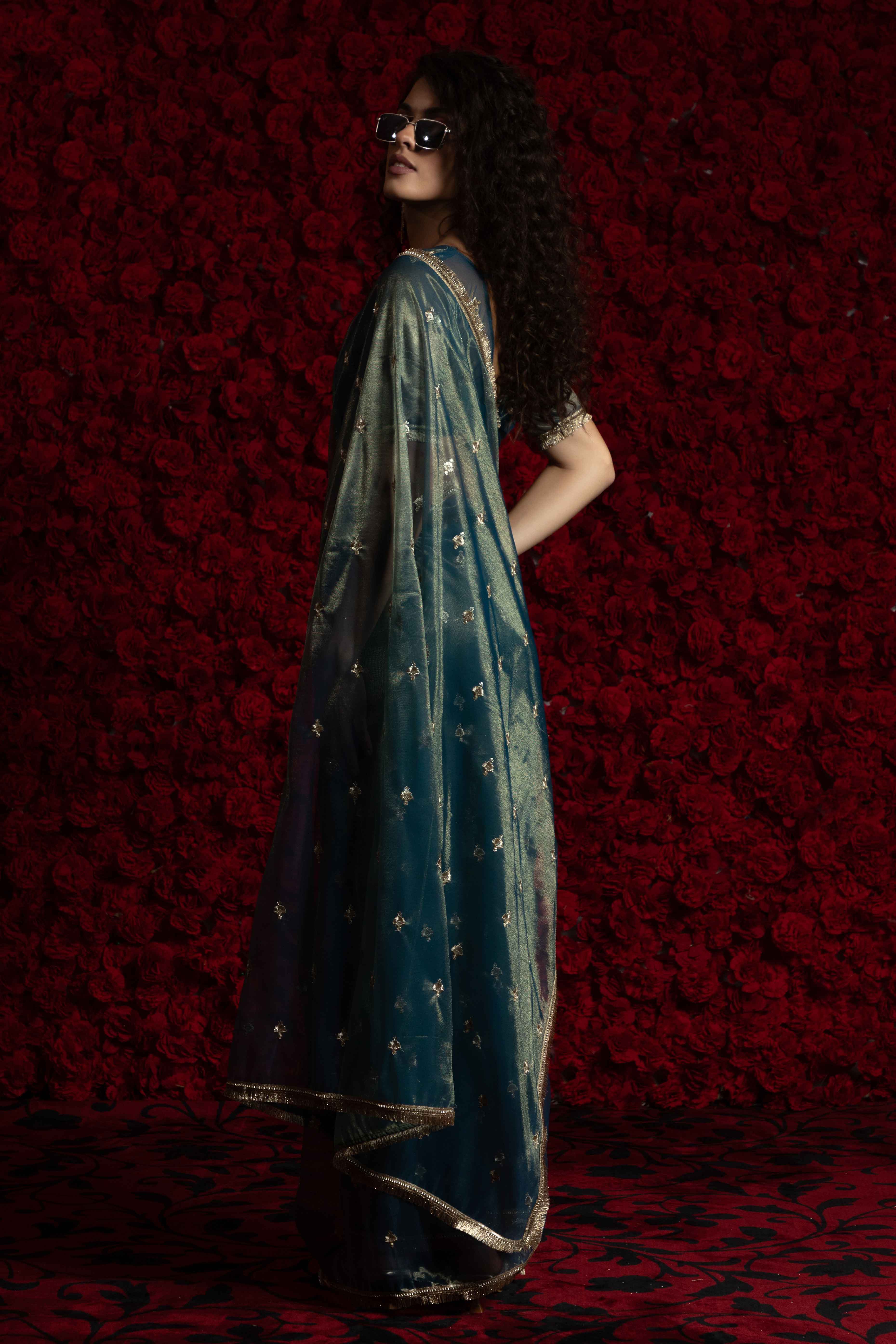 Teal Floral Zari Embroidered Net Organza Saree with Intricate Handwork Lace Border
