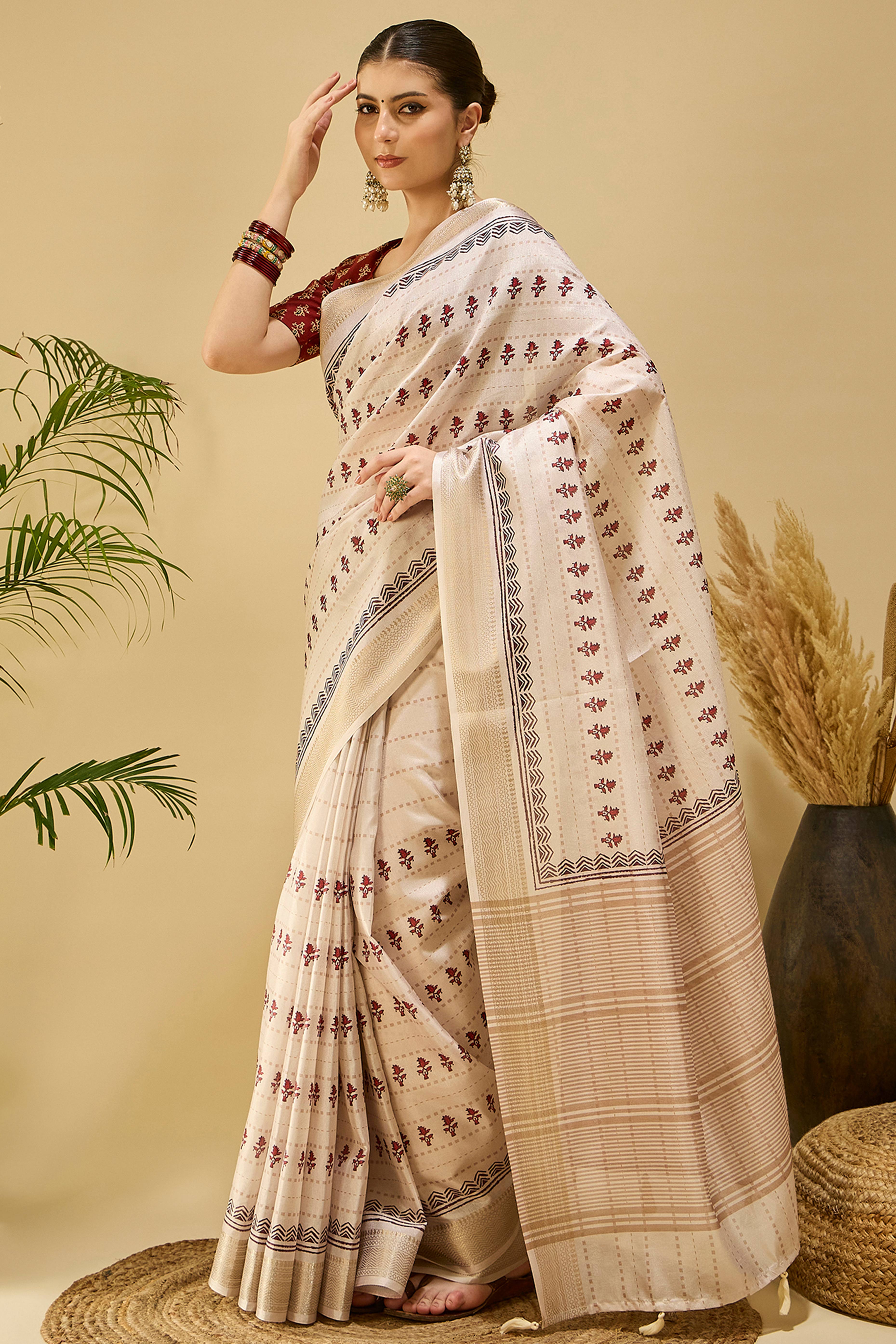 Soft Cream Katki Cotton-Silk Saree With Subtle Floral Motifs & Tassel Edge Pallu