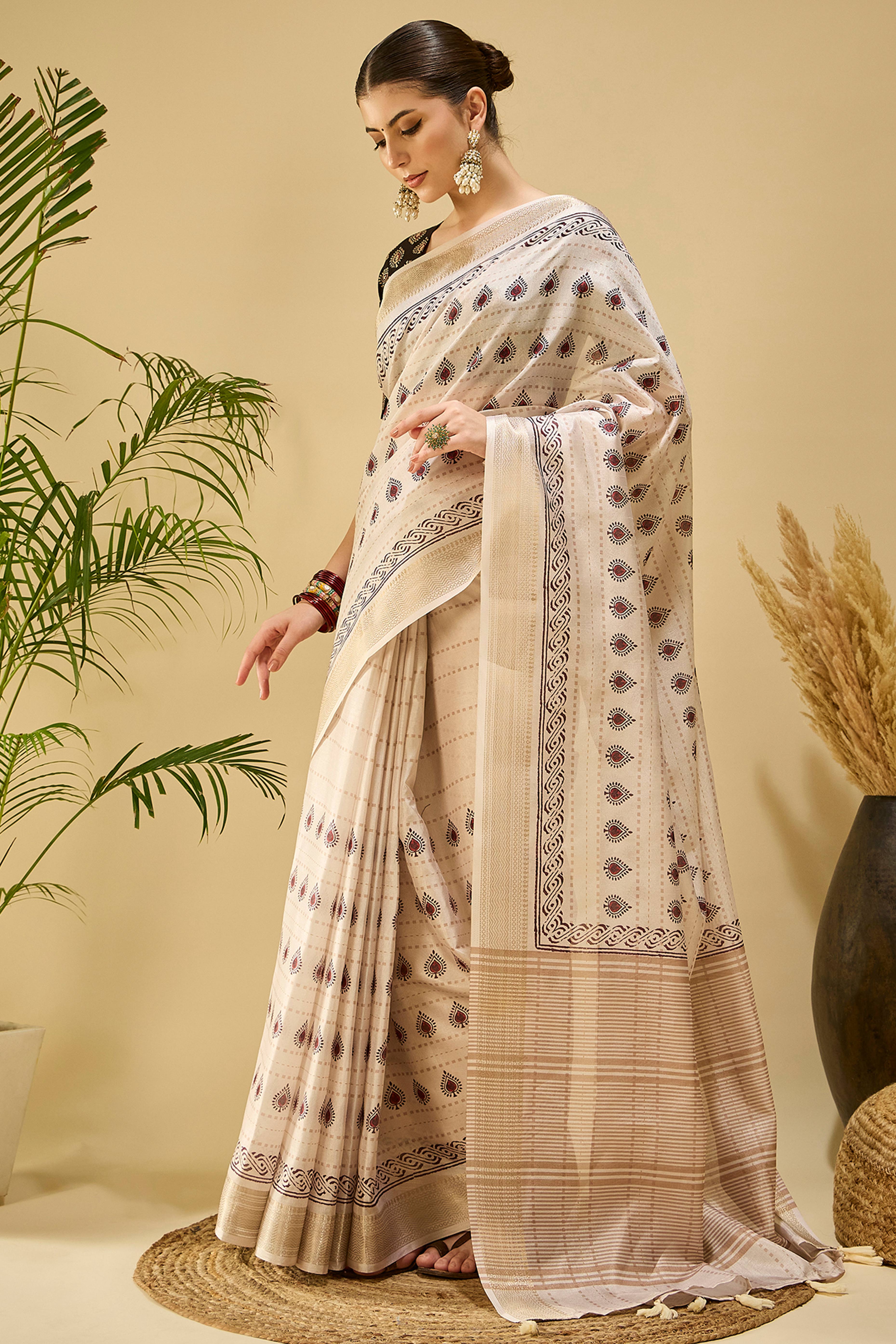 Ivory Cream Floral Printed Katki Cotton Silk Saree With Graceful Tassel Pallu