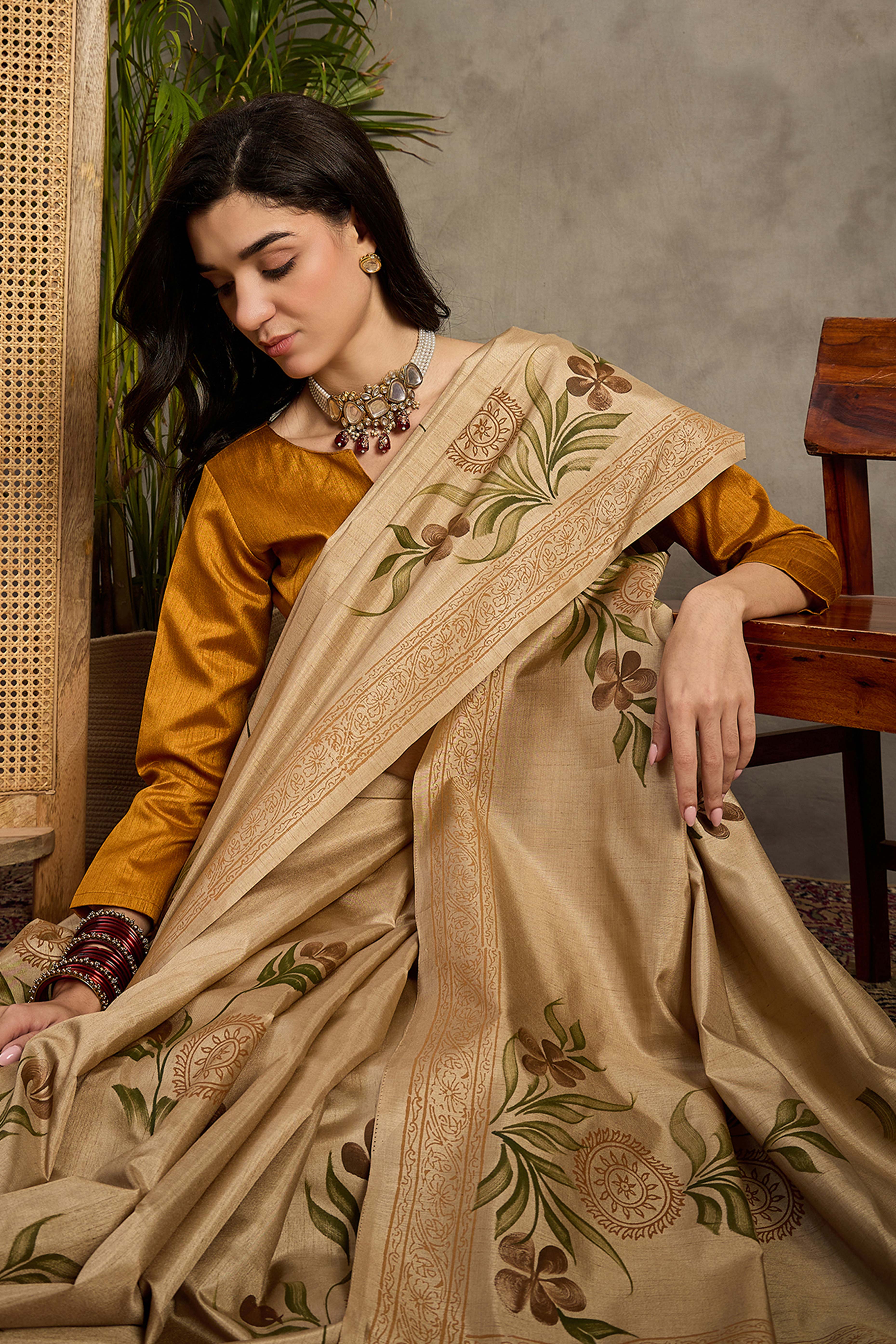 Elegant Beige Floral Print Kozi Cotton Silk Saree Accented With Graceful Tassel Pallu