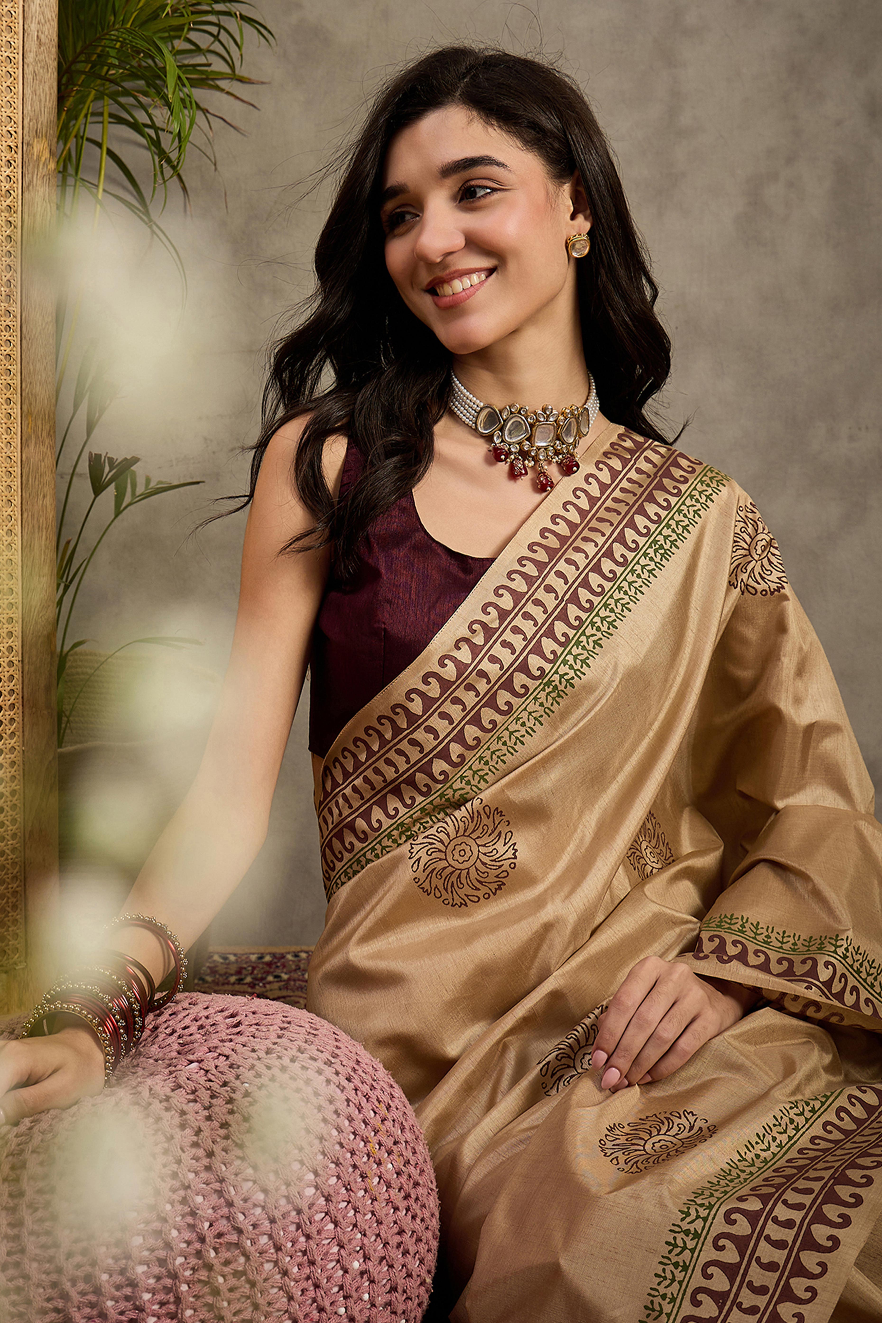 Graceful Beige Floral Printed Kozi Cotton Silk Saree Featuring Tassel Accents Pallu