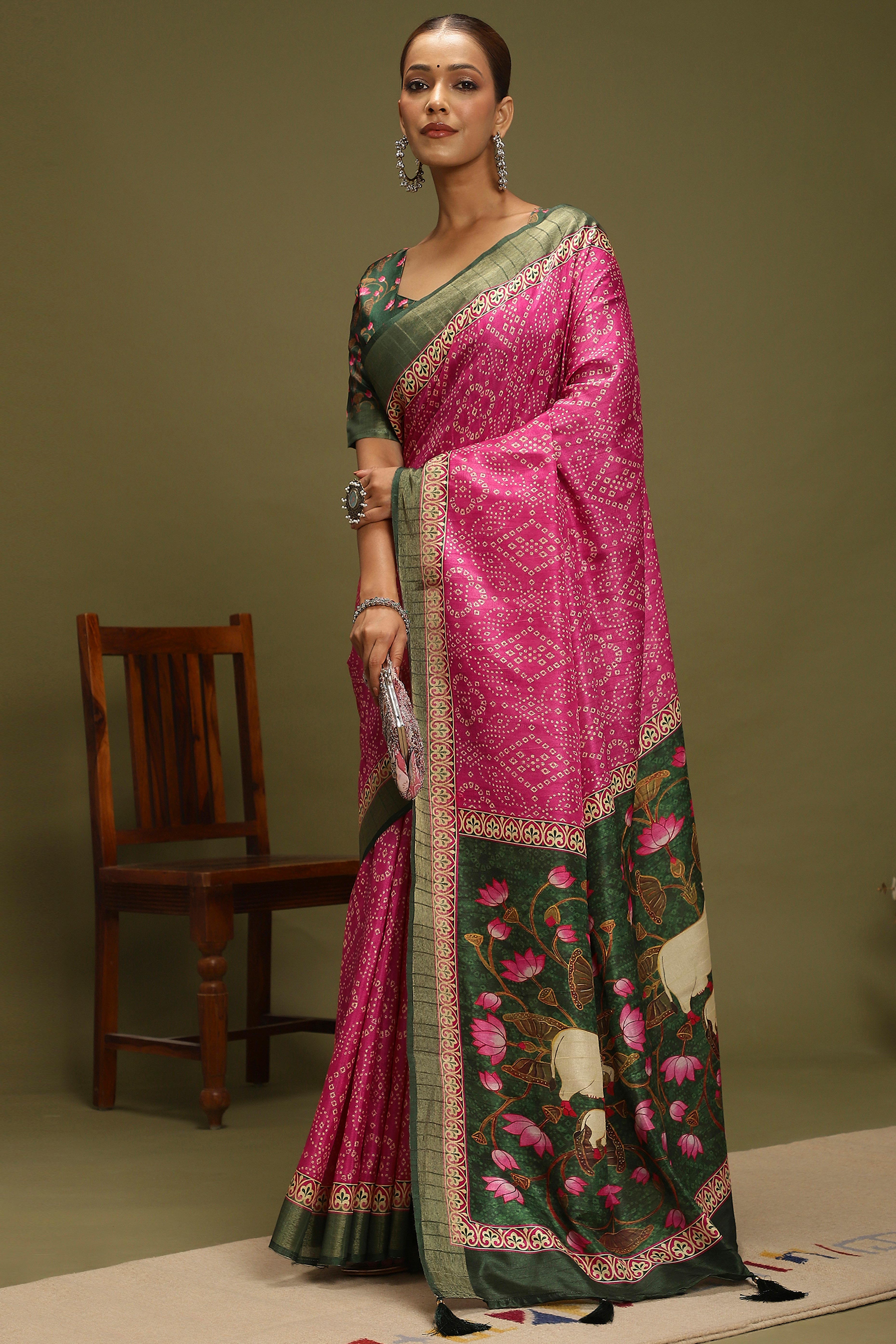 Pink Silk Blend Saree Decorated with Vibrant Bandhani Prints and Festive Detailing