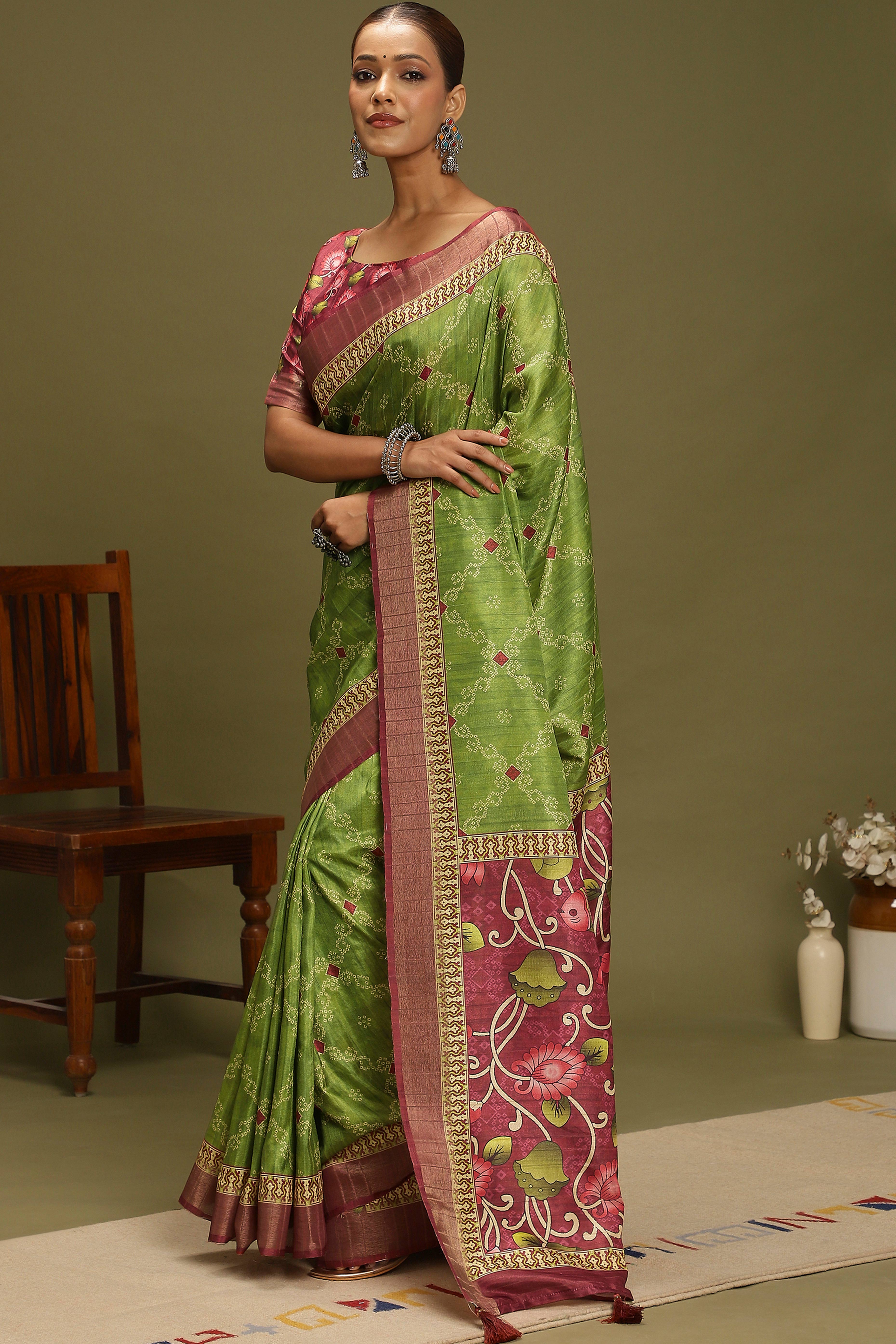 Green Silk Blend Saree Decorated with Vibrant Bandhani Prints and Festive Detailing