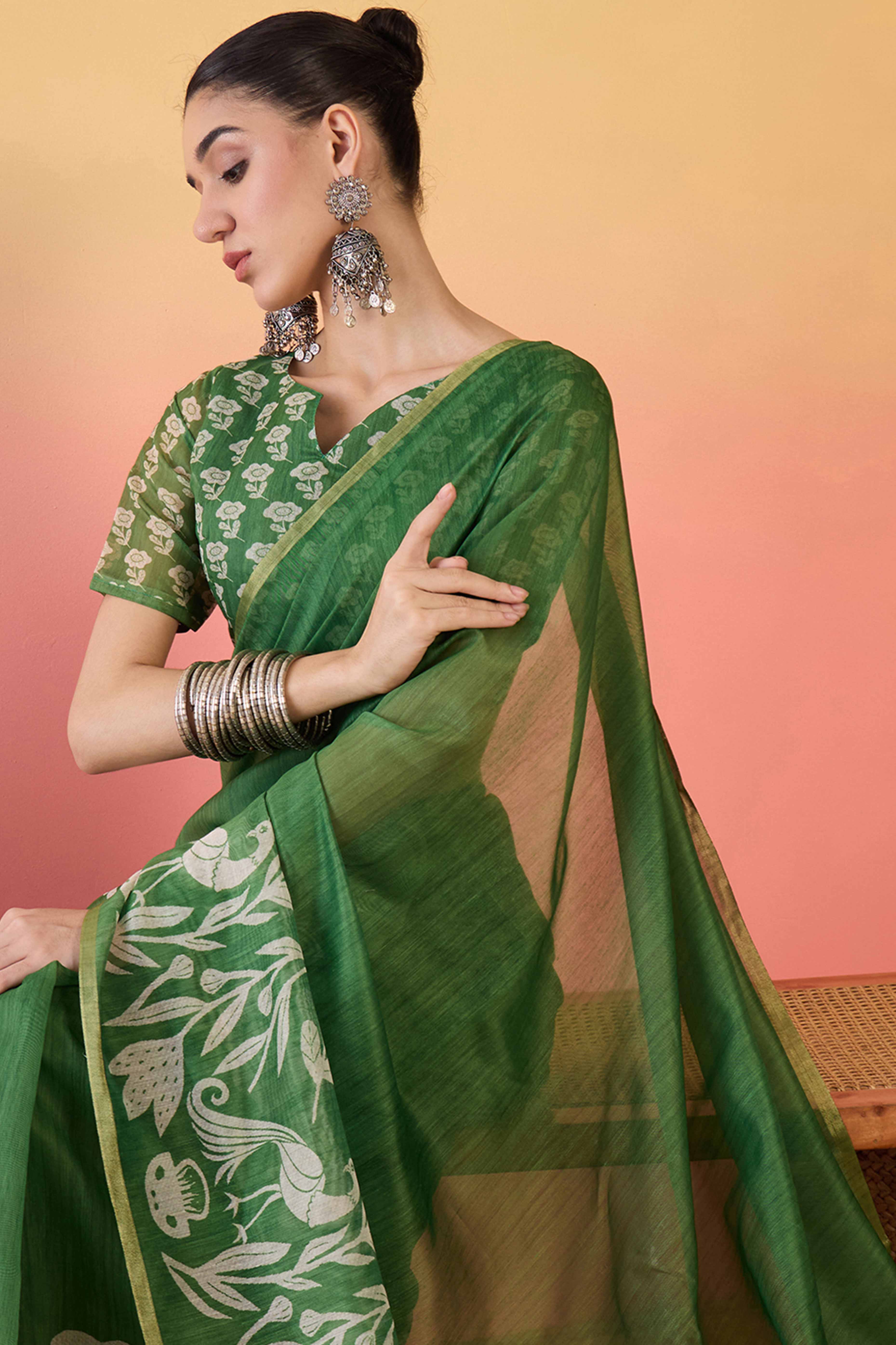 Green Linen Cotton Saree Featuring Elegant Floral & Bird Prints With Tassel Pallu