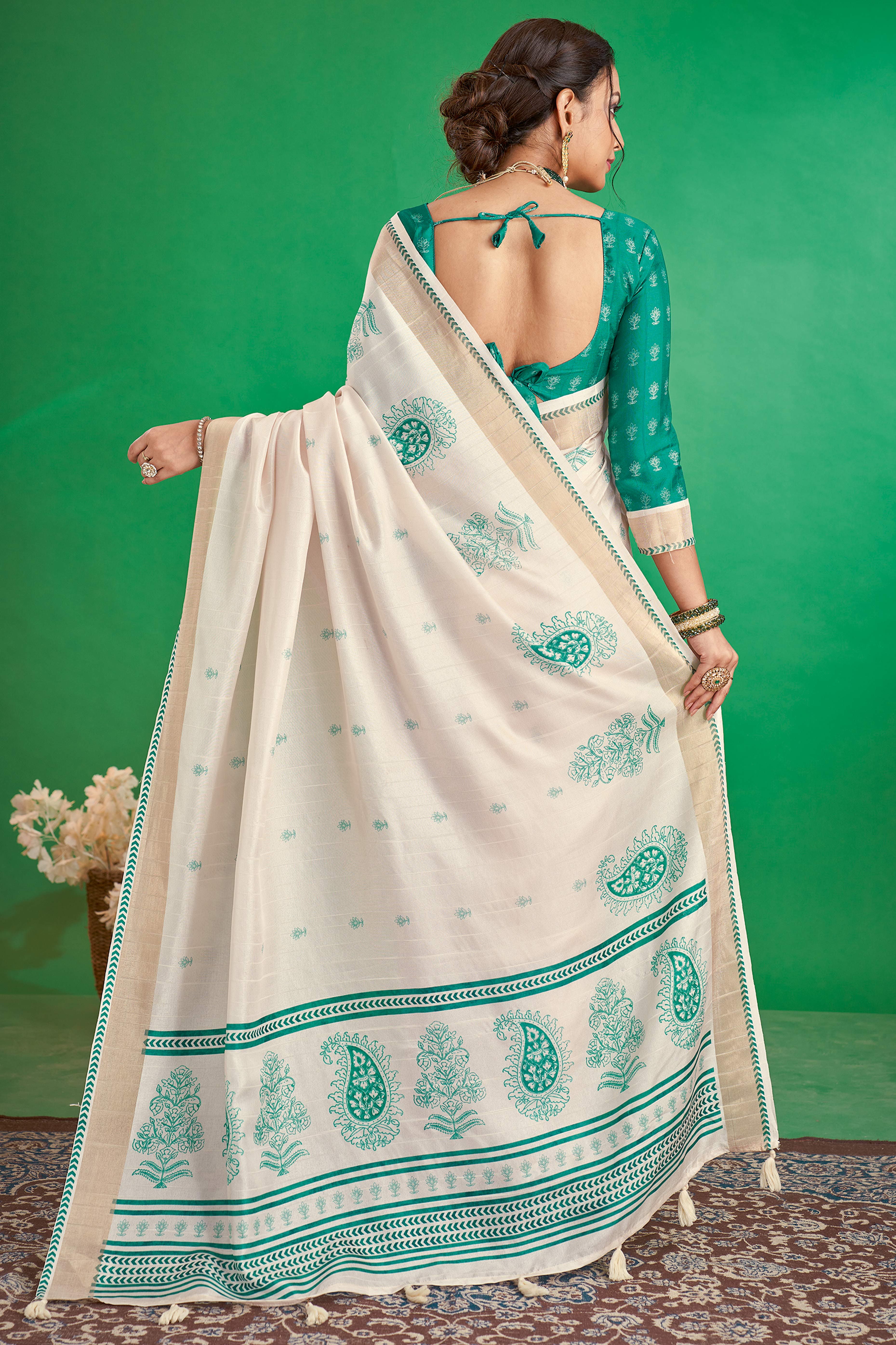 Charming Offwhite & Rama Floral Printed Kotha Cotton Silk Saree Adorned With Graceful Tassel Pallu