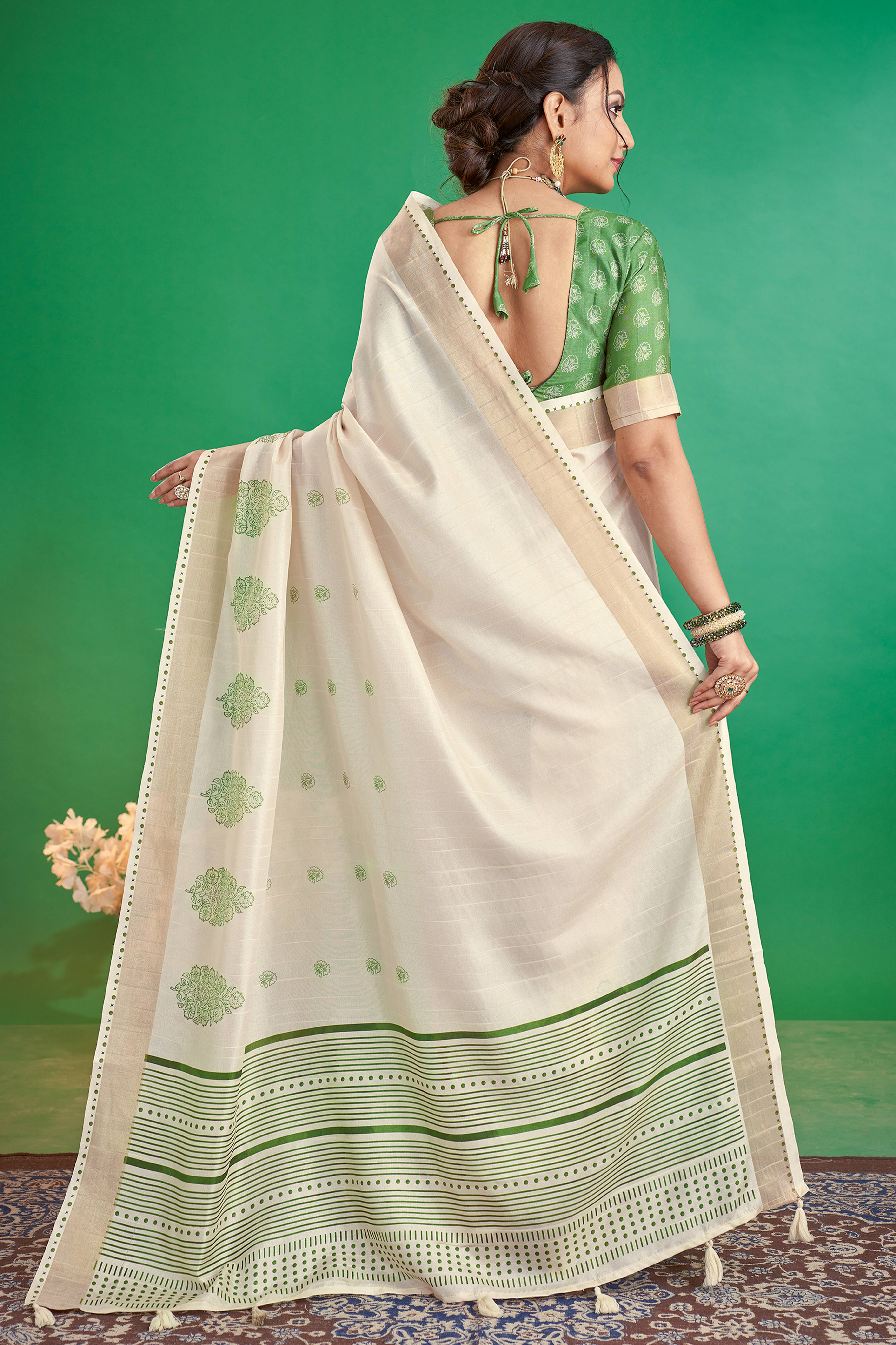 Charming Offwhite & Green Floral Printed Kotha Cotton Silk Saree Adorned With Graceful Tassel Pallu