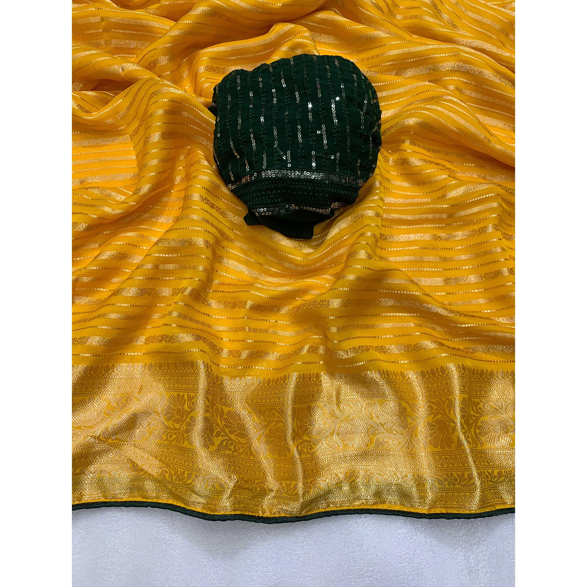 Yellow & Green Woven Georgette Saree With Tassels
