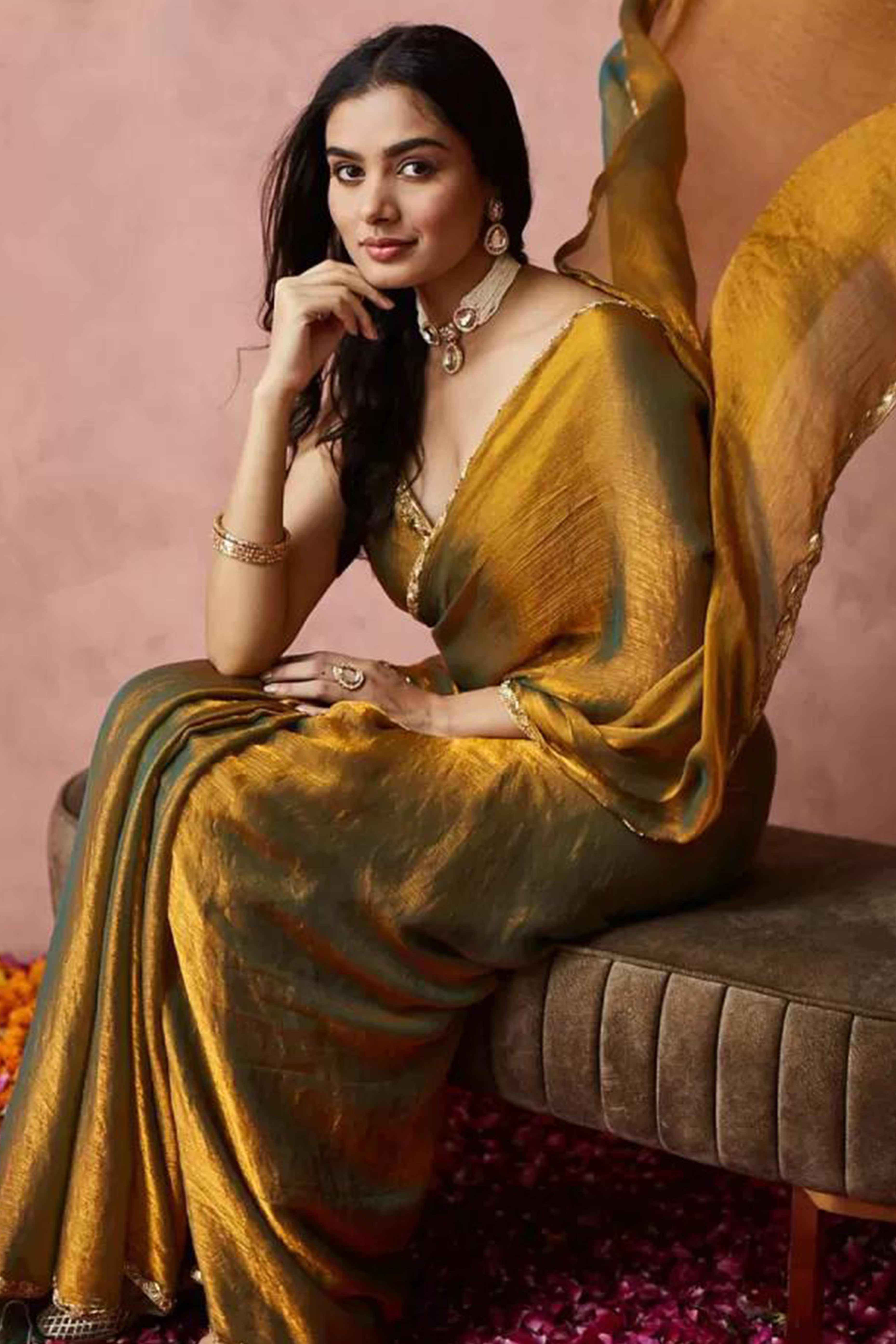 Shimmering Metallic Gold Chiffon Solid Saree With Stone Detailing