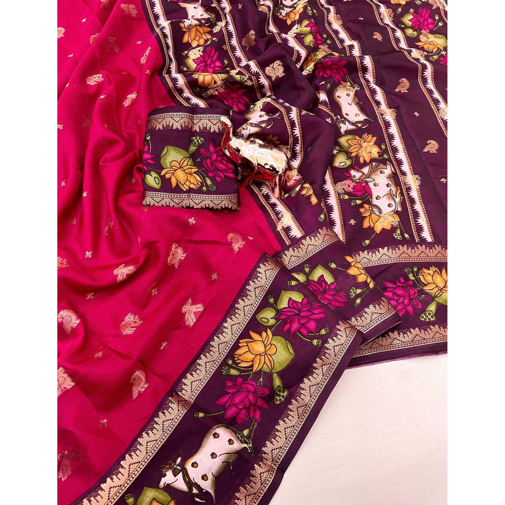 Elegant Pink Peacock Pattern Zari Weaving Georgette Saree With Tassel Pallu