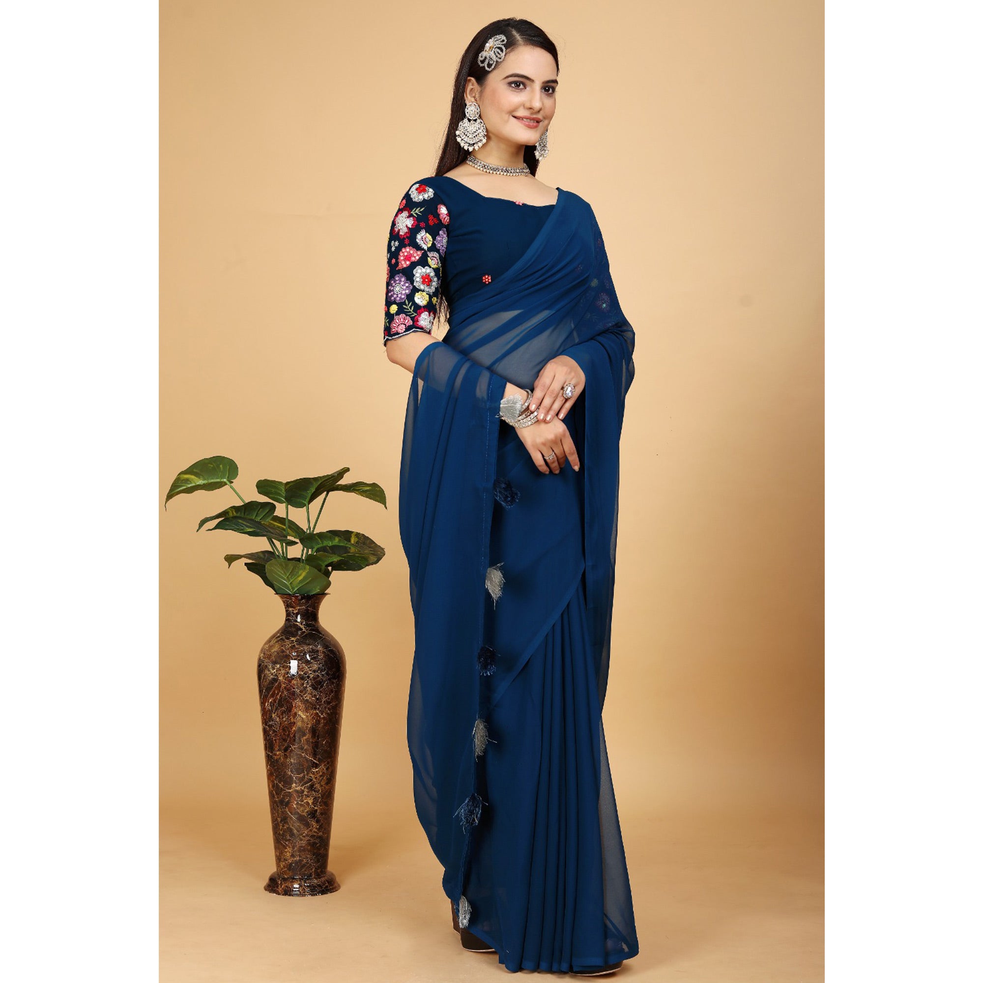 Blue Solid Georgette Saree With Tassels