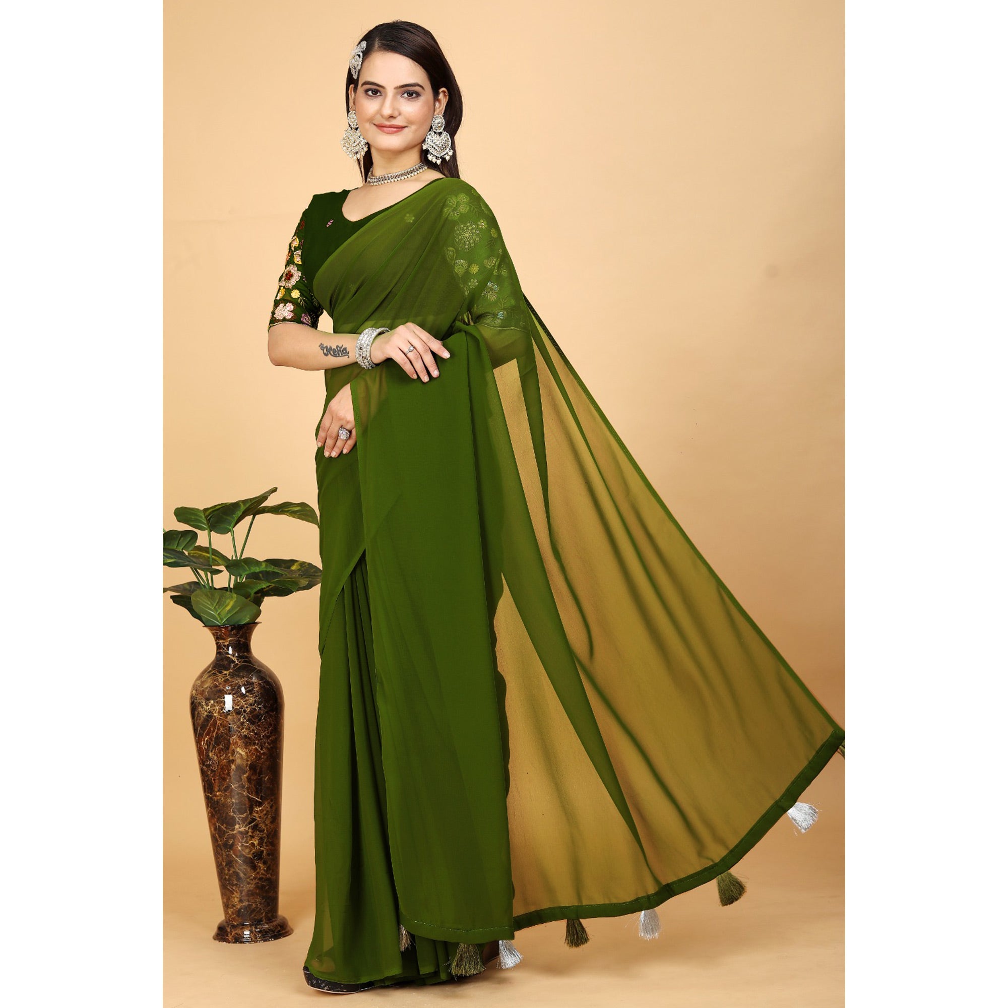 Green Solid Georgette Saree With Tassels