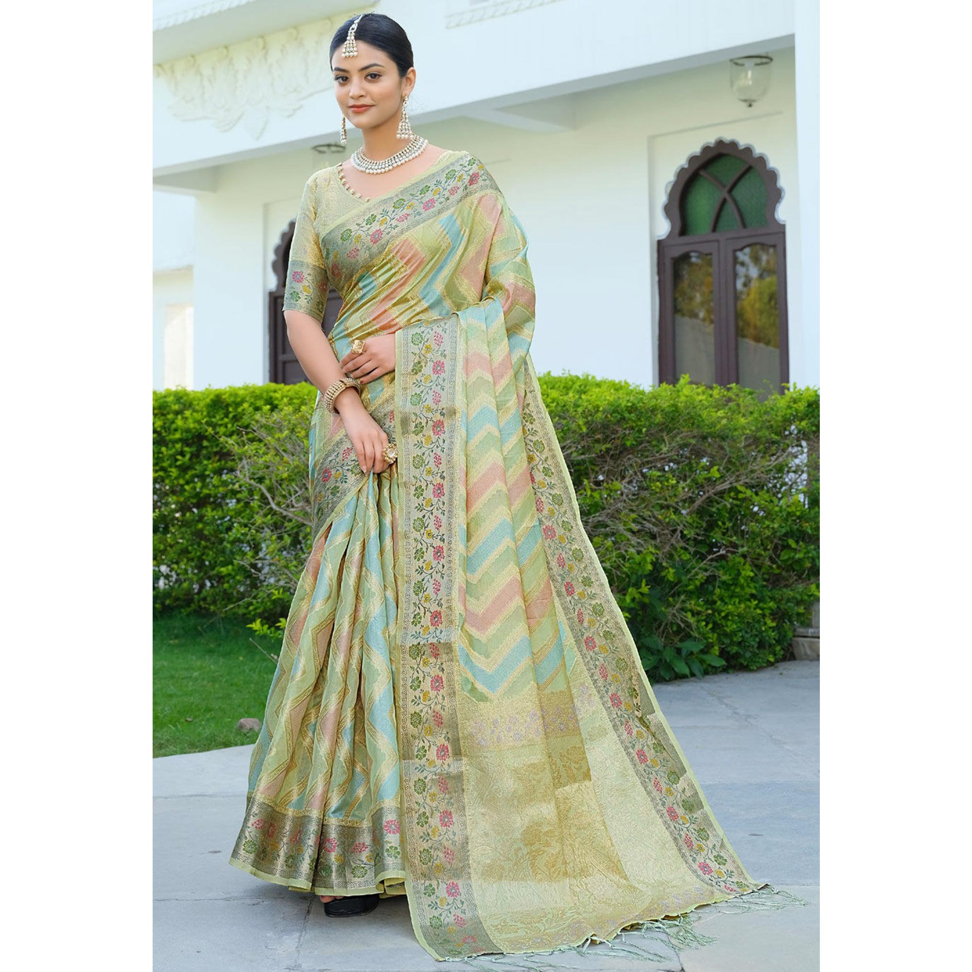 Green Woven Organza Saree With Tassels