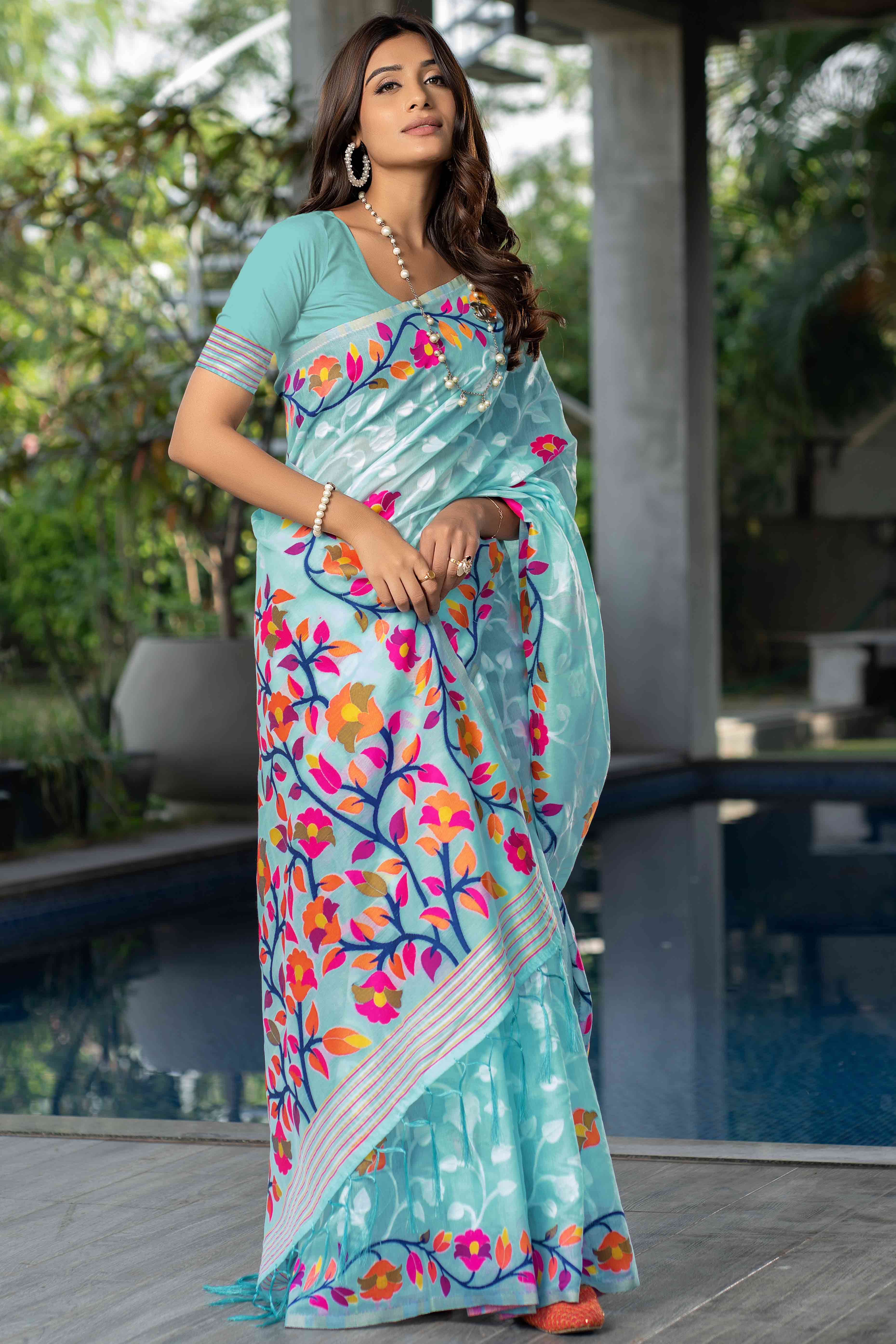 Blue Floral Woven Cotton Jacquard Jamdani Saree With A Graceful Tassel Border