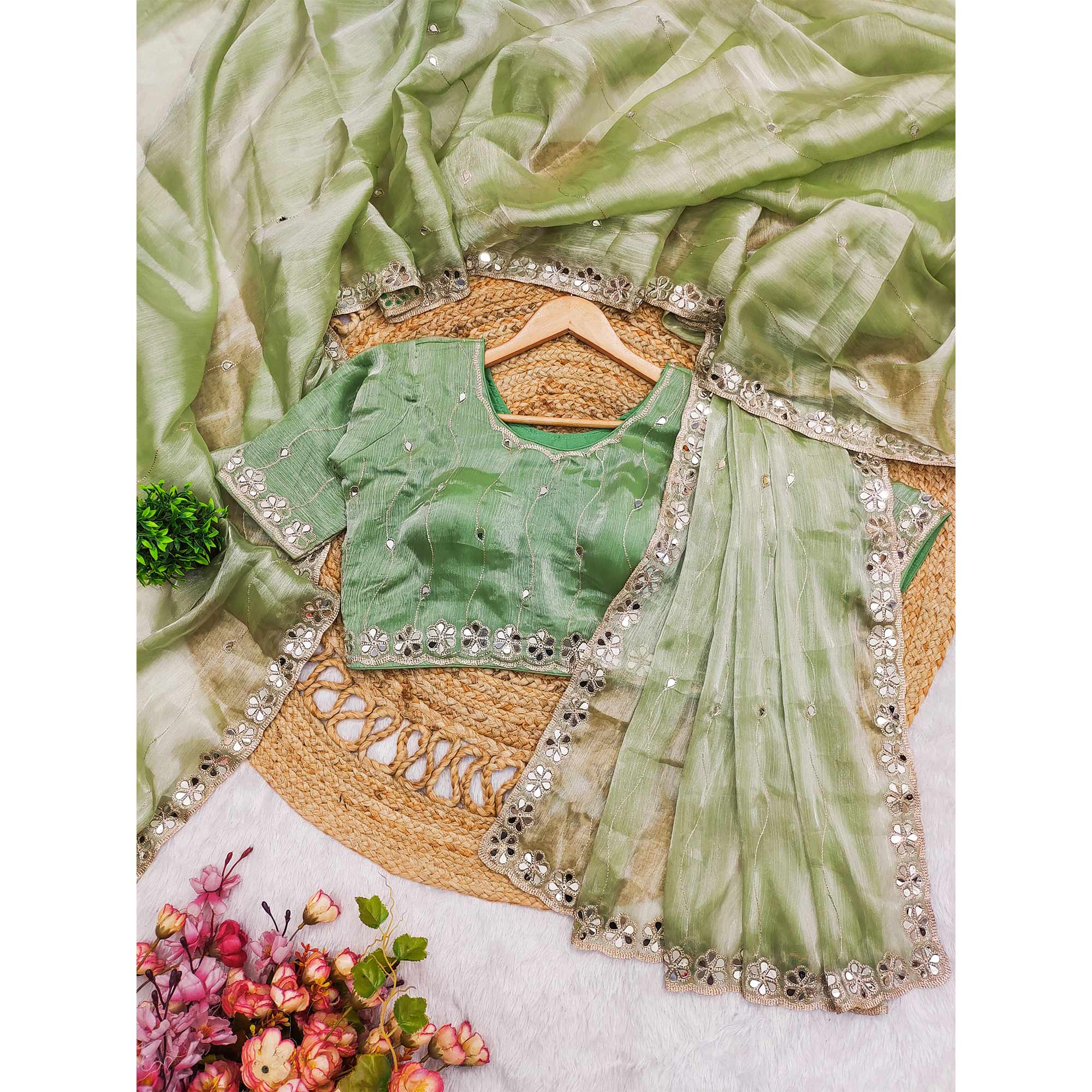 Pista Green Art Silk Saree Highlighted with Embroidery & Mirror Detailing