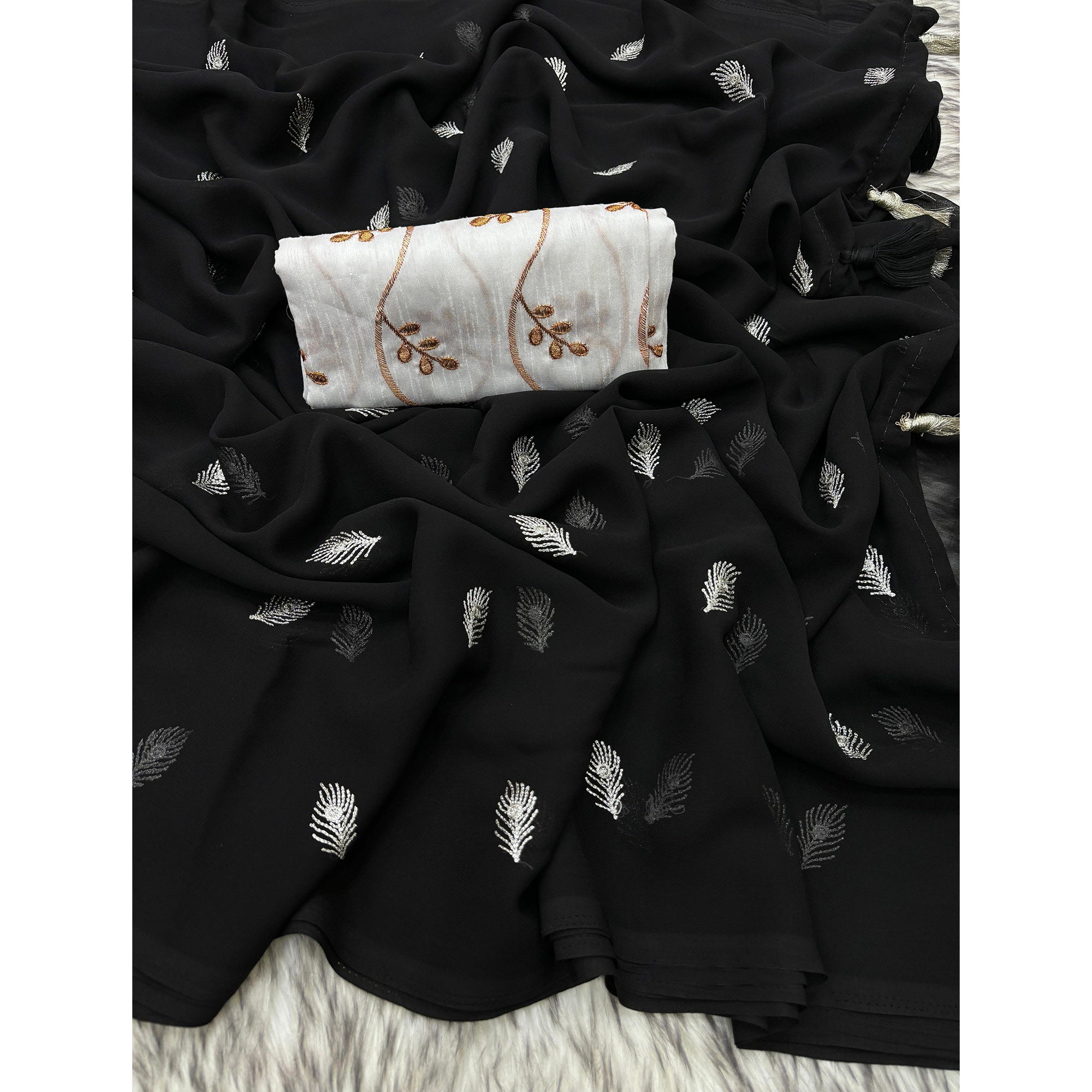 Black Embroidered Georgette Saree With Tassels