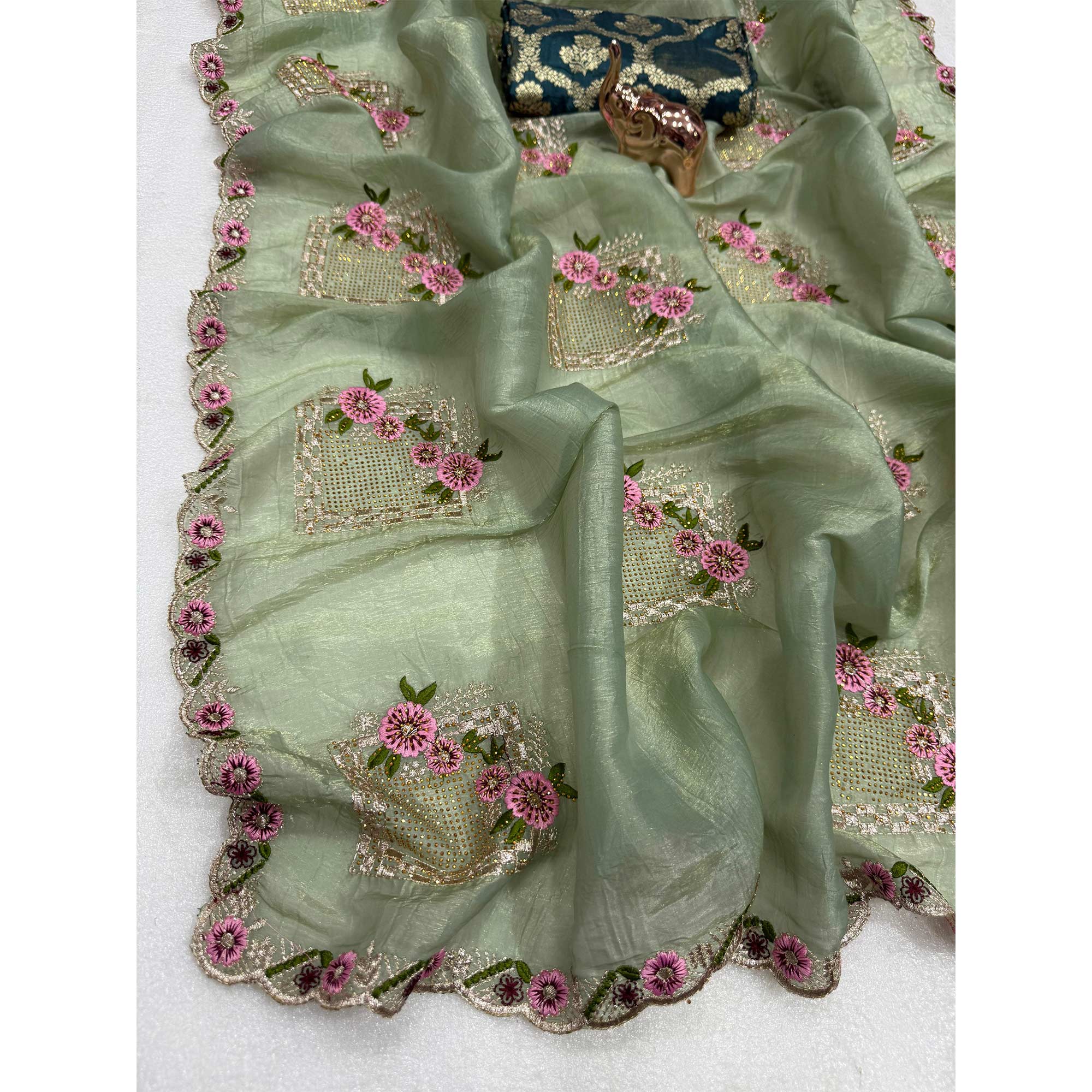 Stunning Sage Green Floral Embroidery & Swarovski Adorned Paper Silk Saree with Cutwork Border