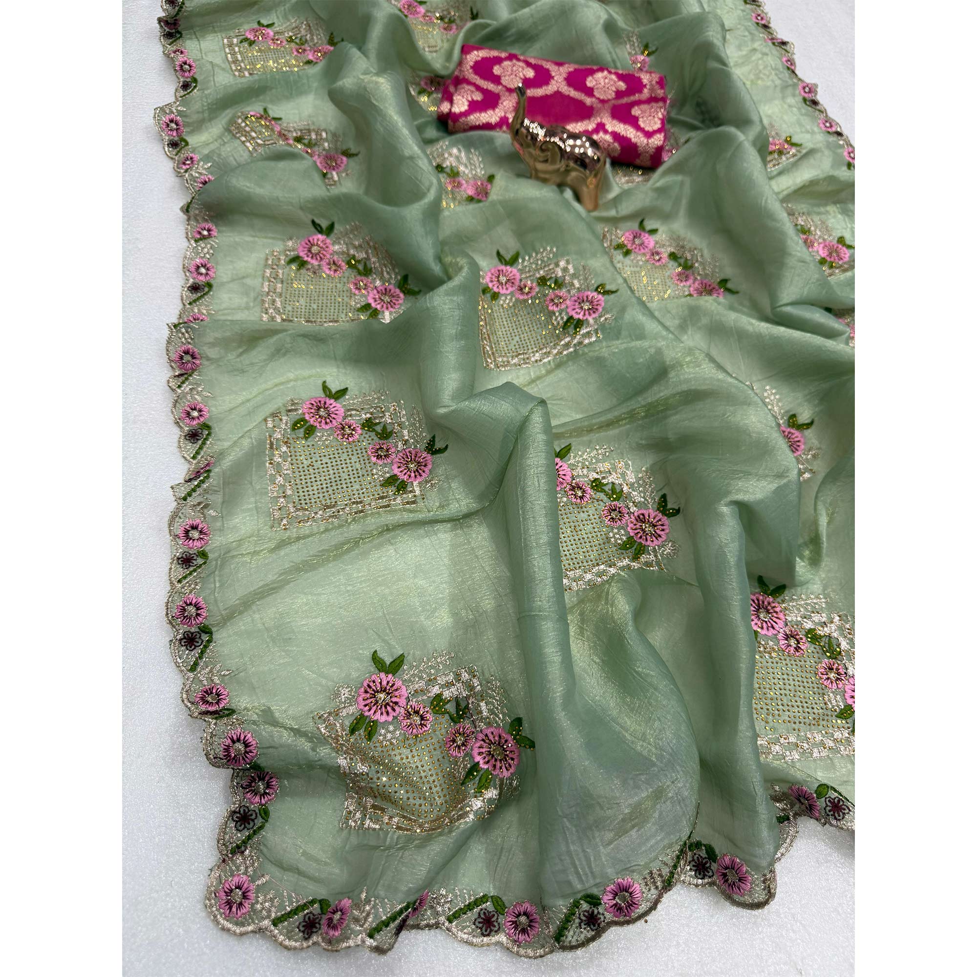 Stunning Sage Green Floral Embroidery & Swarovski Adorned Paper Silk Saree with Cutwork Border