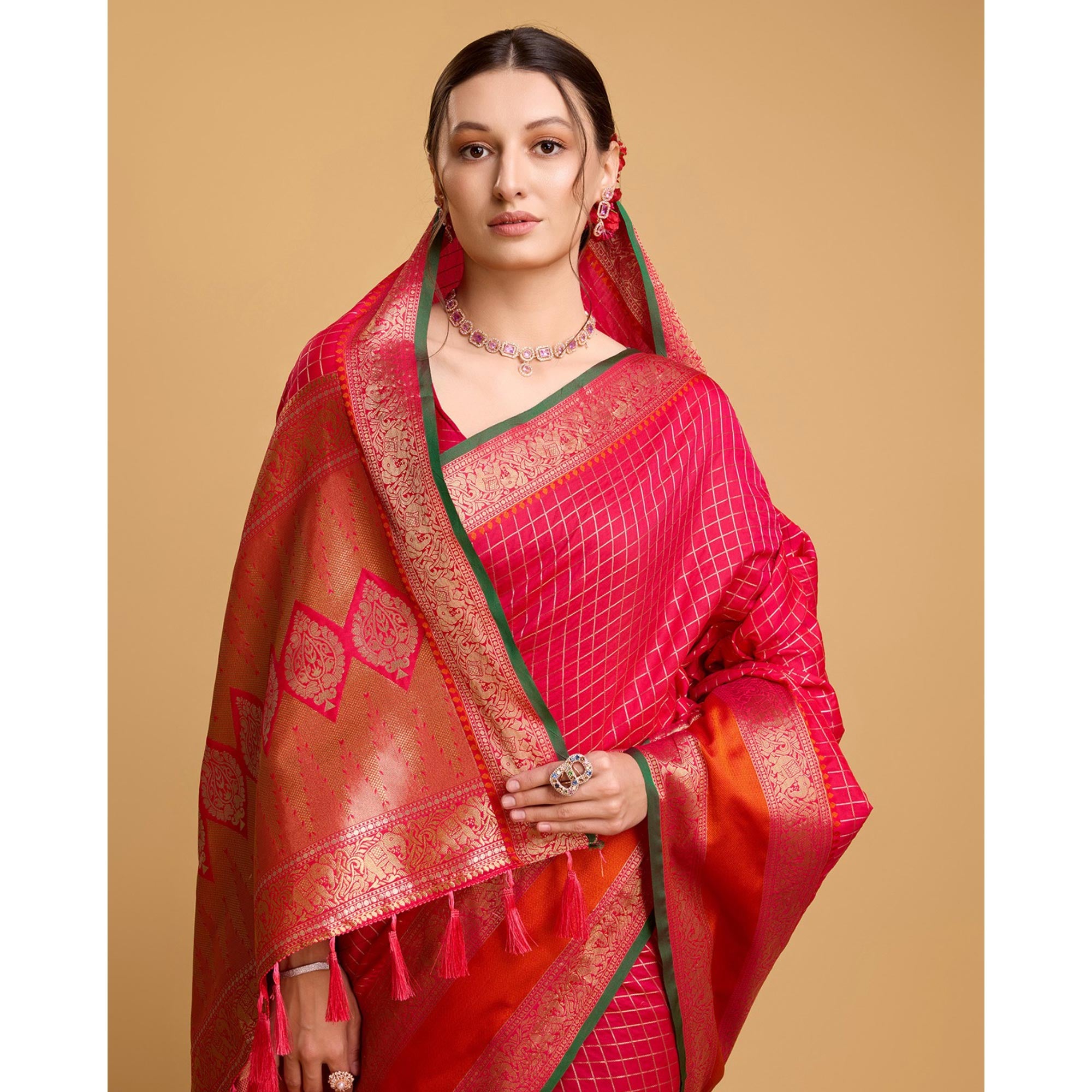 Pink Checks Woven Pure Silk Saree With Tassels