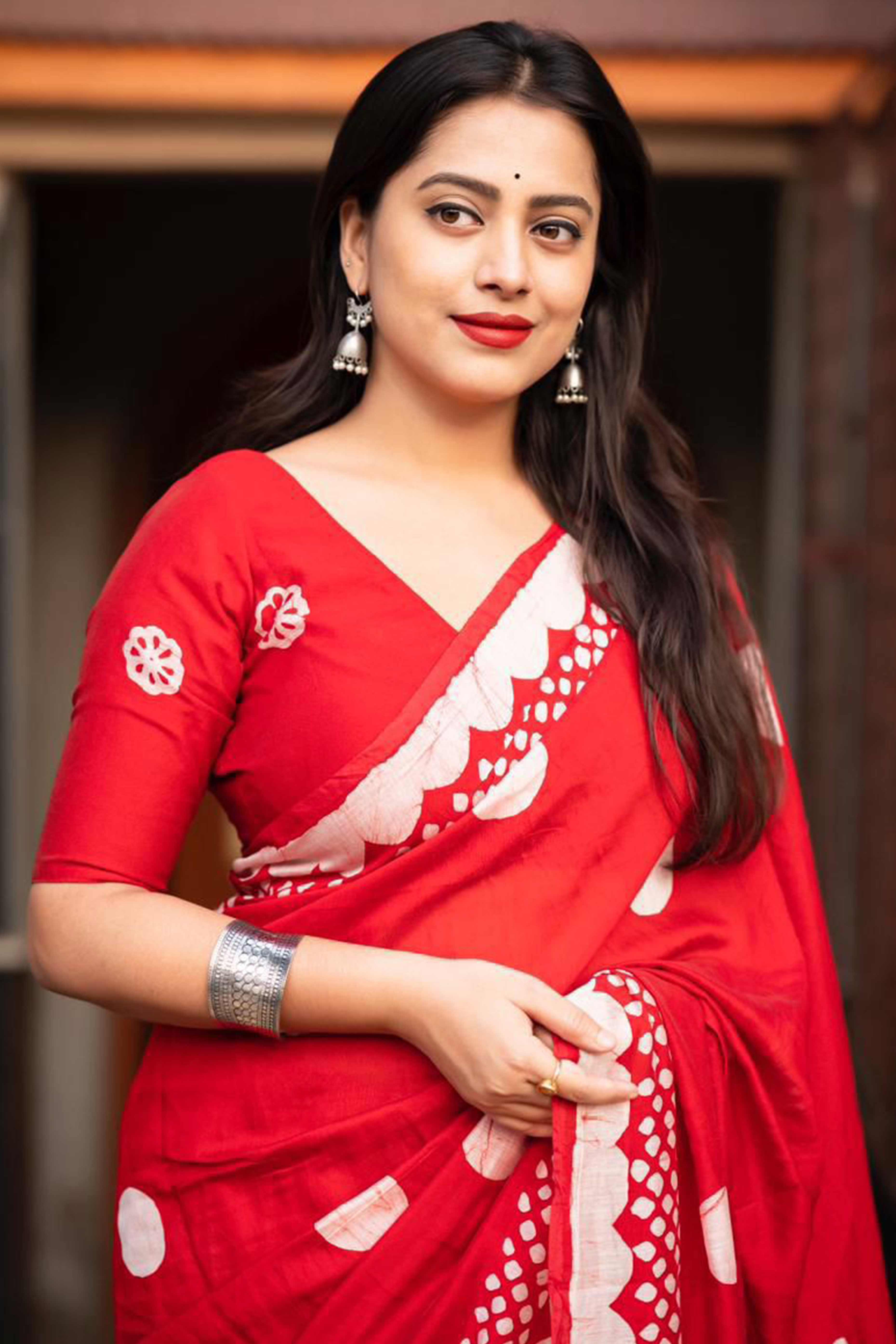 Red Linen Saree With Vibrant Polka Digital Print & Trendy Tassel Pallu