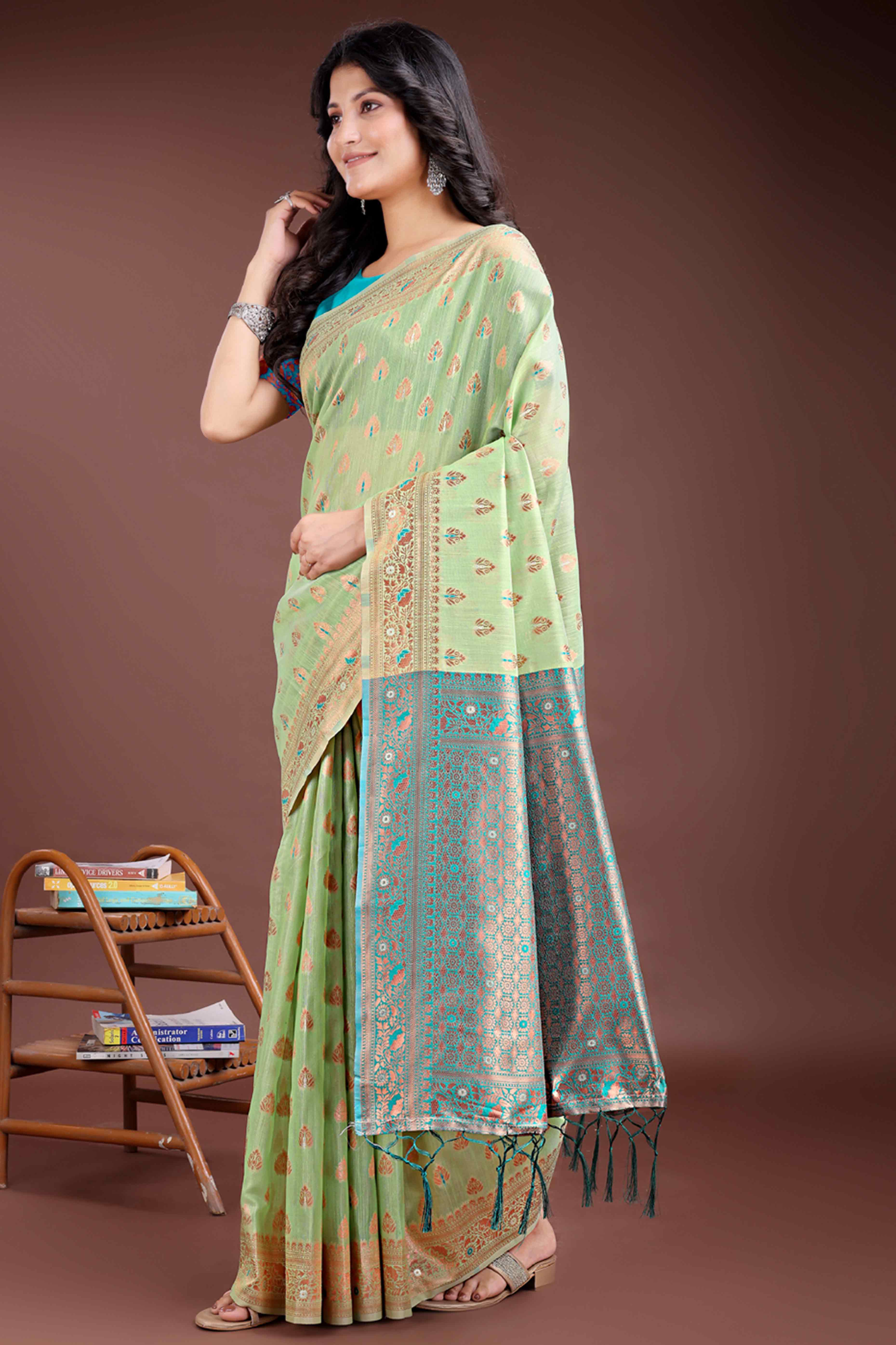 Harmonious Light Green Floral Zari Weaving Cotton Blend Saree with Graceful Tassels