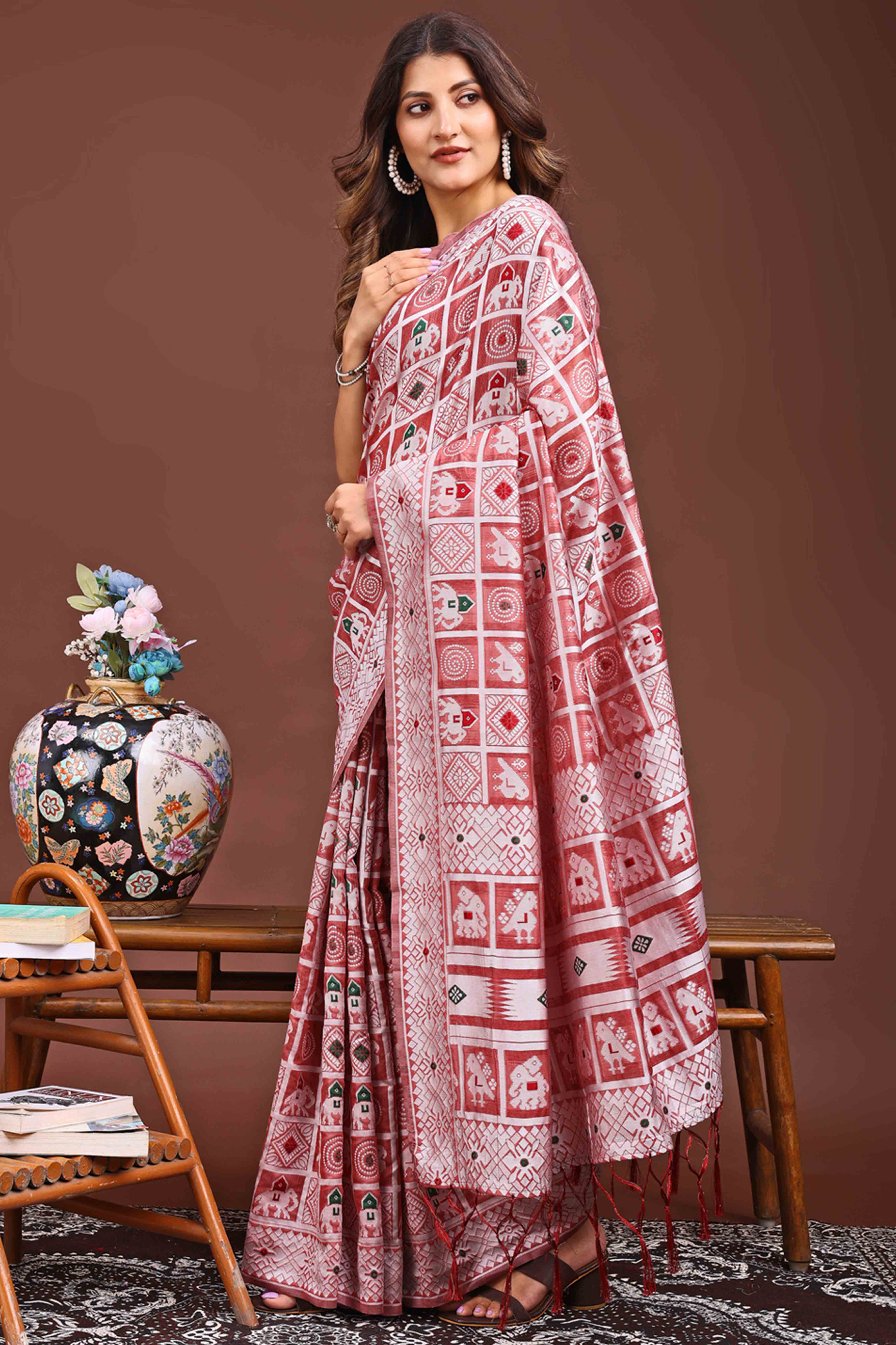 Peach Linen Cotton Saree Adorned With Zari Weaving & Tassel pallu
