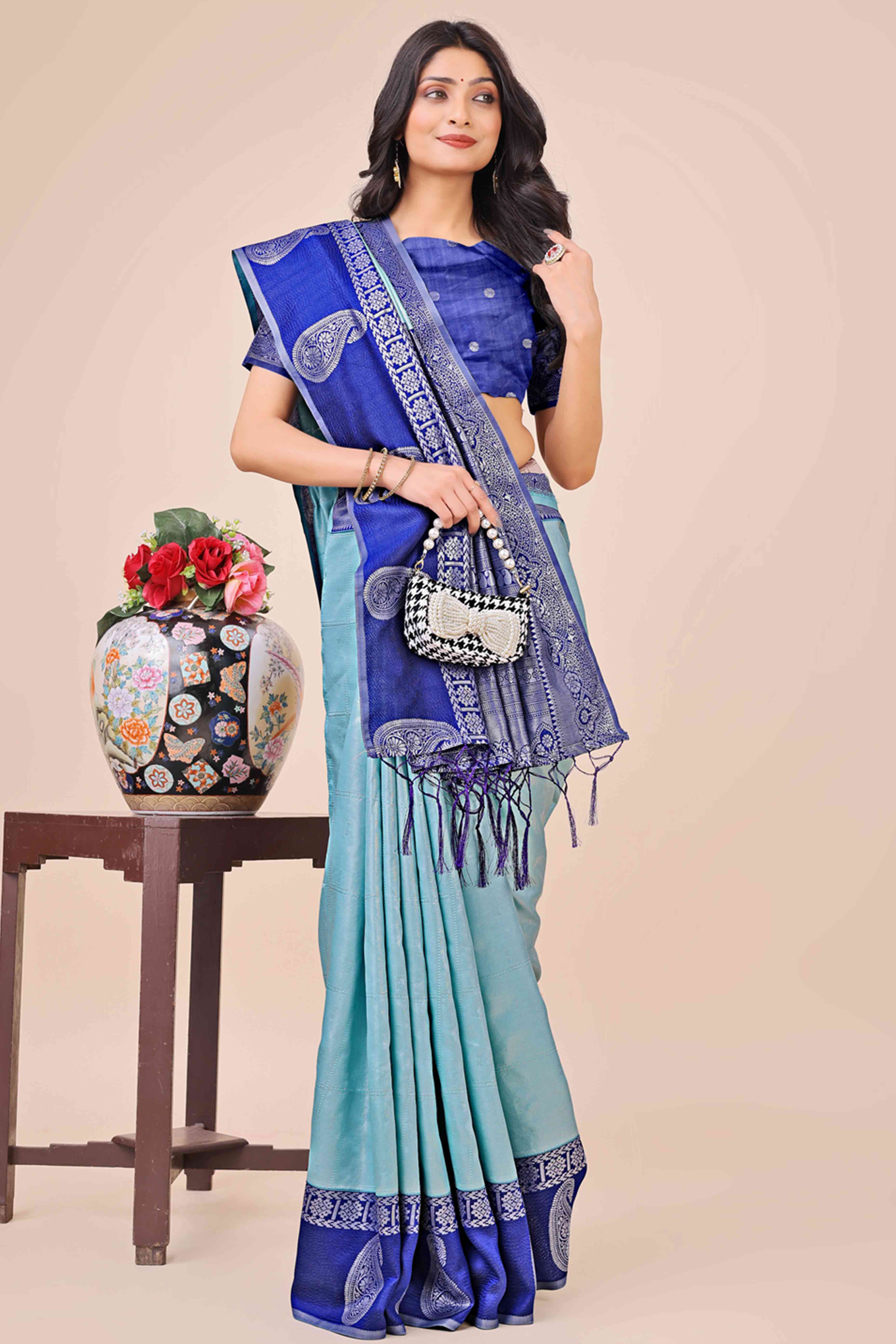 Light Blue Lichi Silk Blend Saree With Intricate Paisley Zari Weave & Graceful Tassels