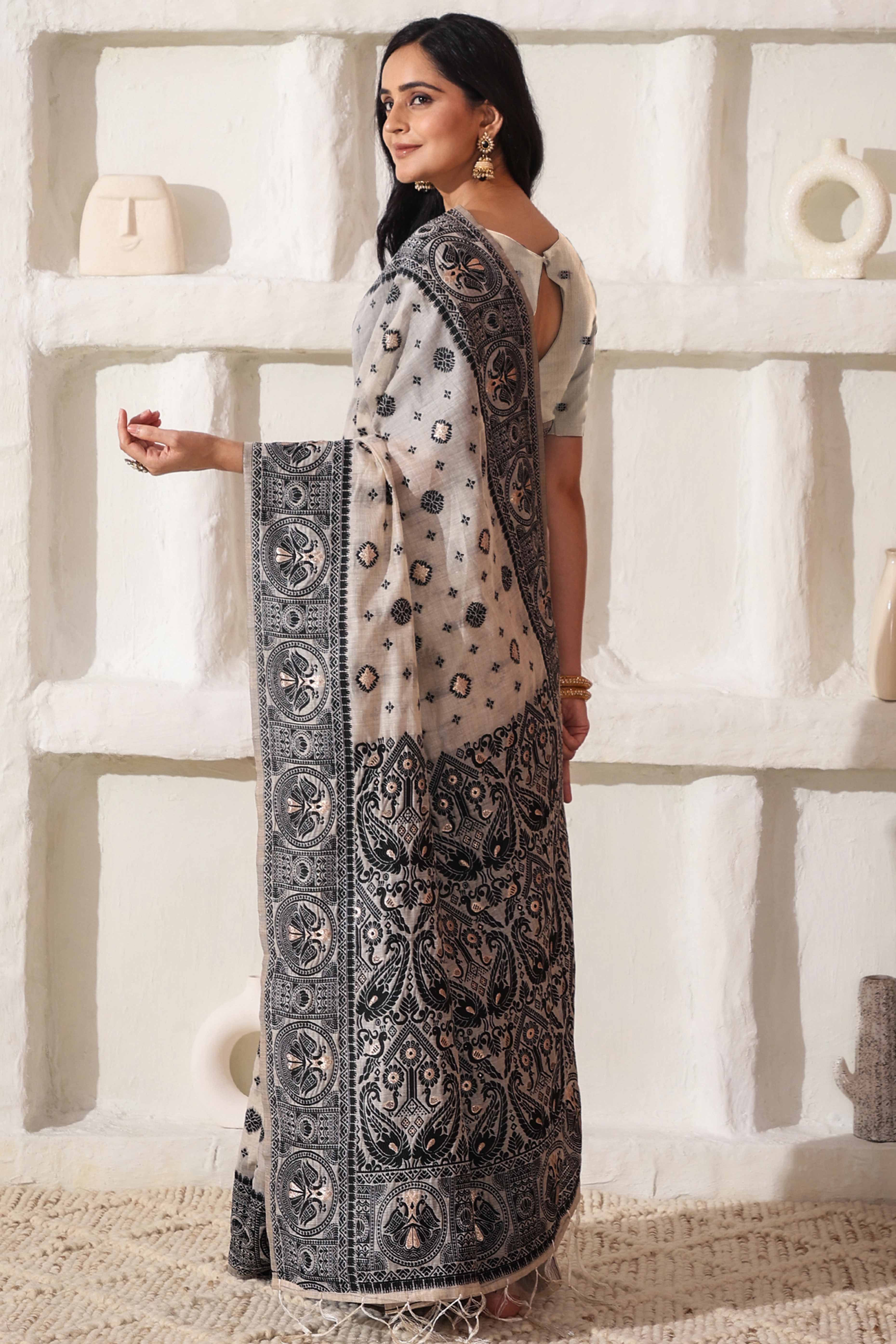Cream & Black Saree In Linen Cotton With Traditional Zari Woven Detailing And Tassel Pallu