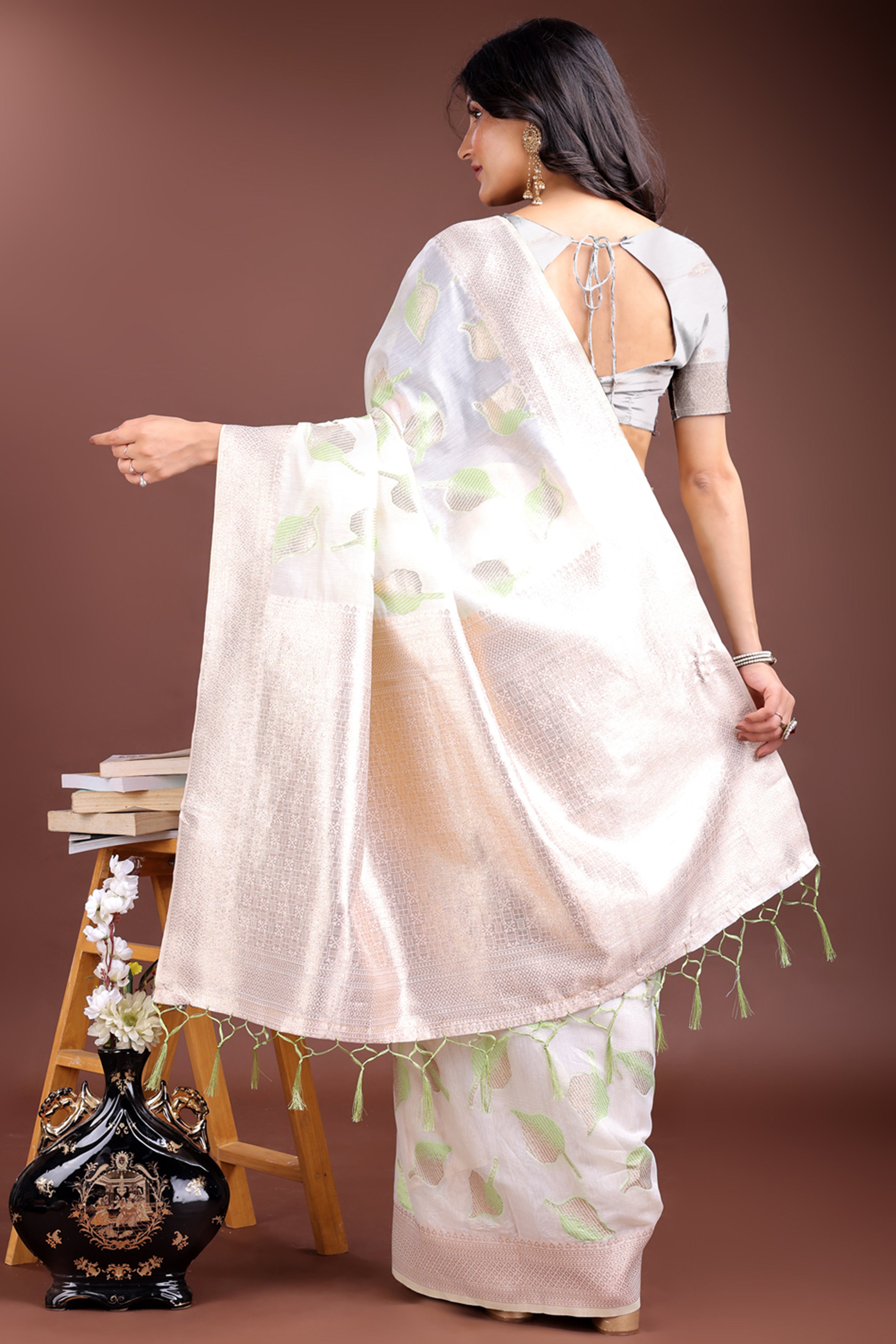 White and Light Green Cotton Silk Saree with Leaf Motifs and Zari Border Tassels