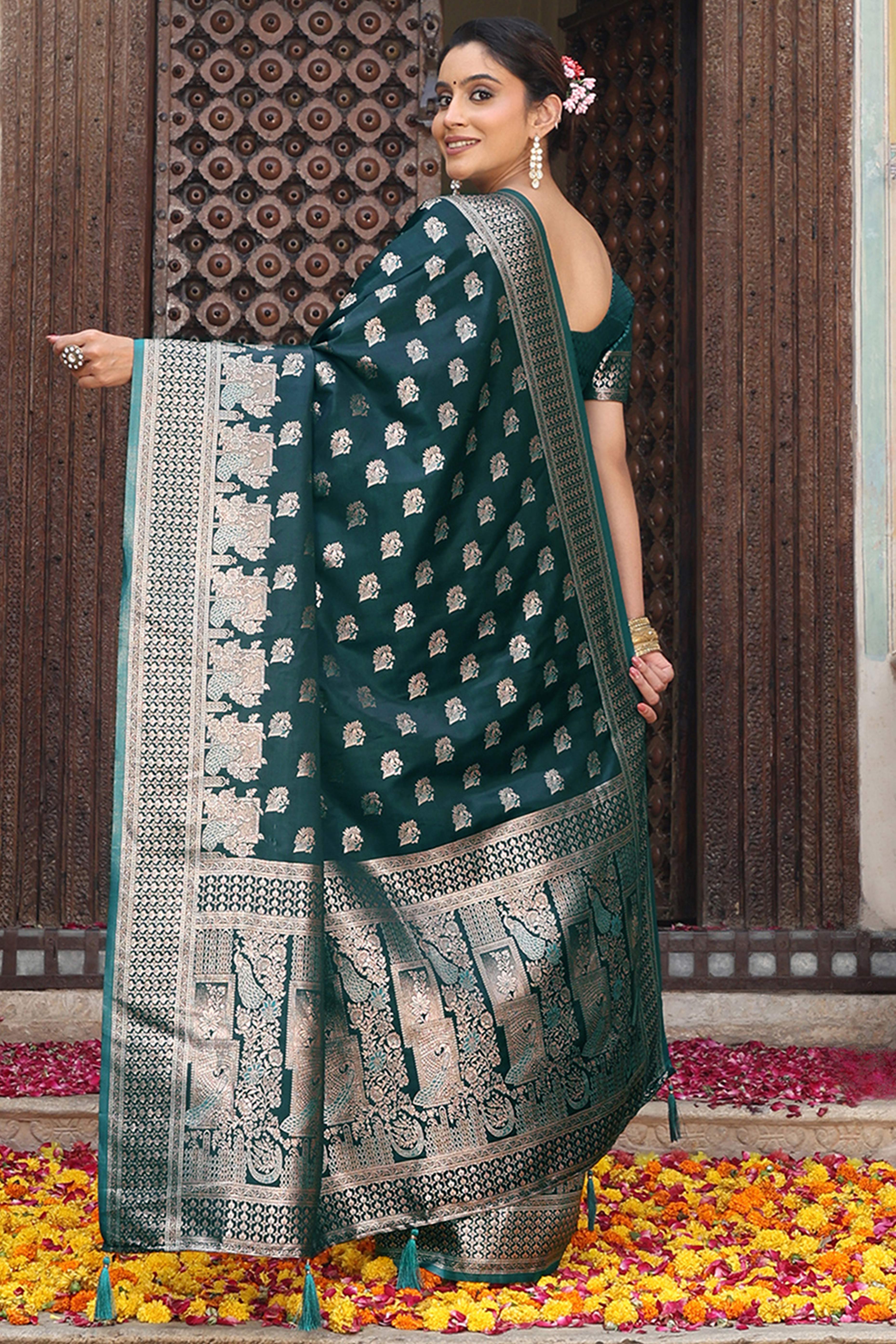 Designer Dark Teal Saree Showcasing Peacock & Floral Zari Weaving With Handmade Tassel Pallu