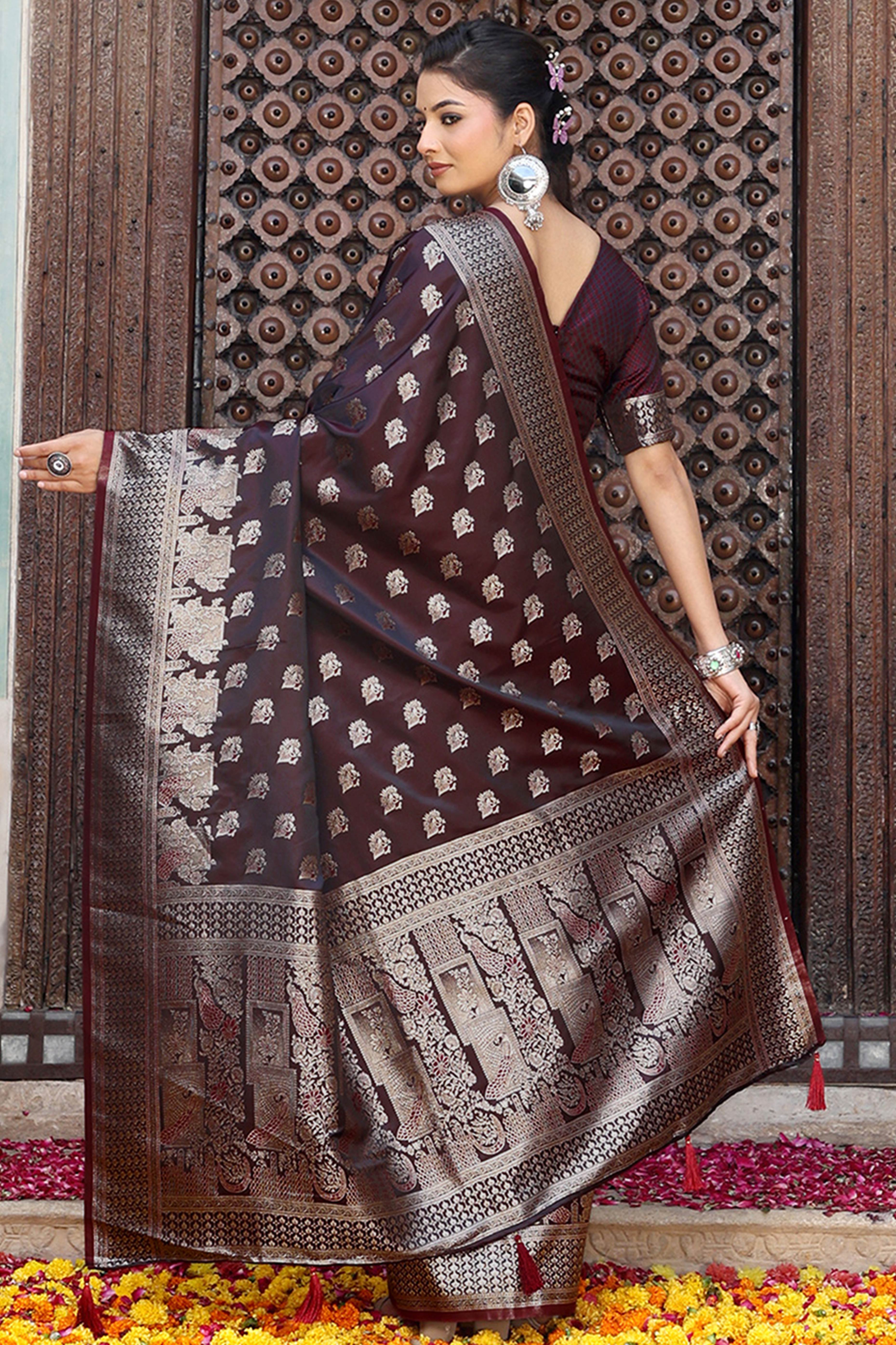 Designer Dark Maroon Saree Showcasing Peacock & Floral Zari Weaving With Handmade Tassel Pallu