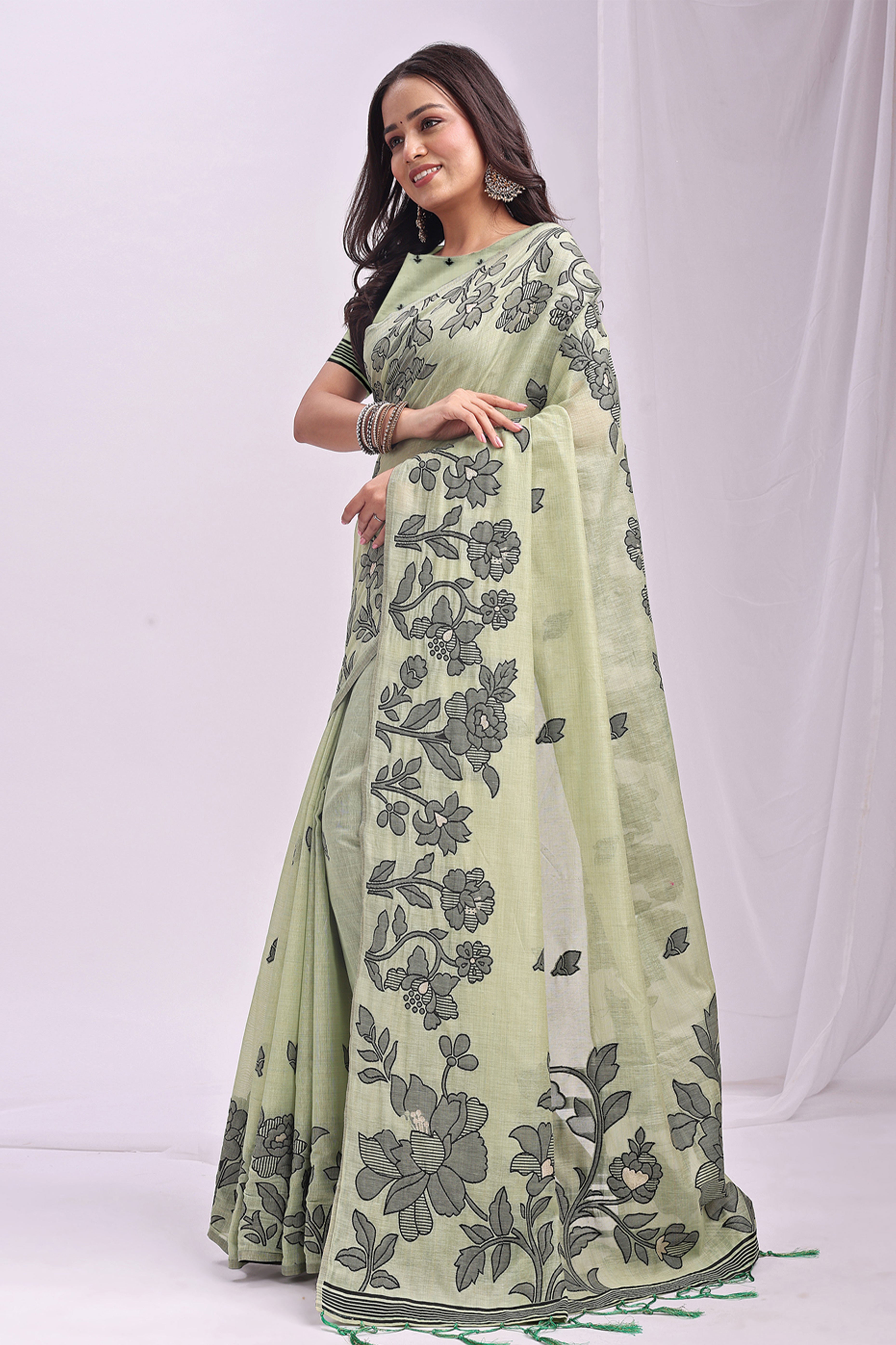 Light Green Ethnic Saree in a Linen Cotton Blend Adorned with Floral Weave Designs