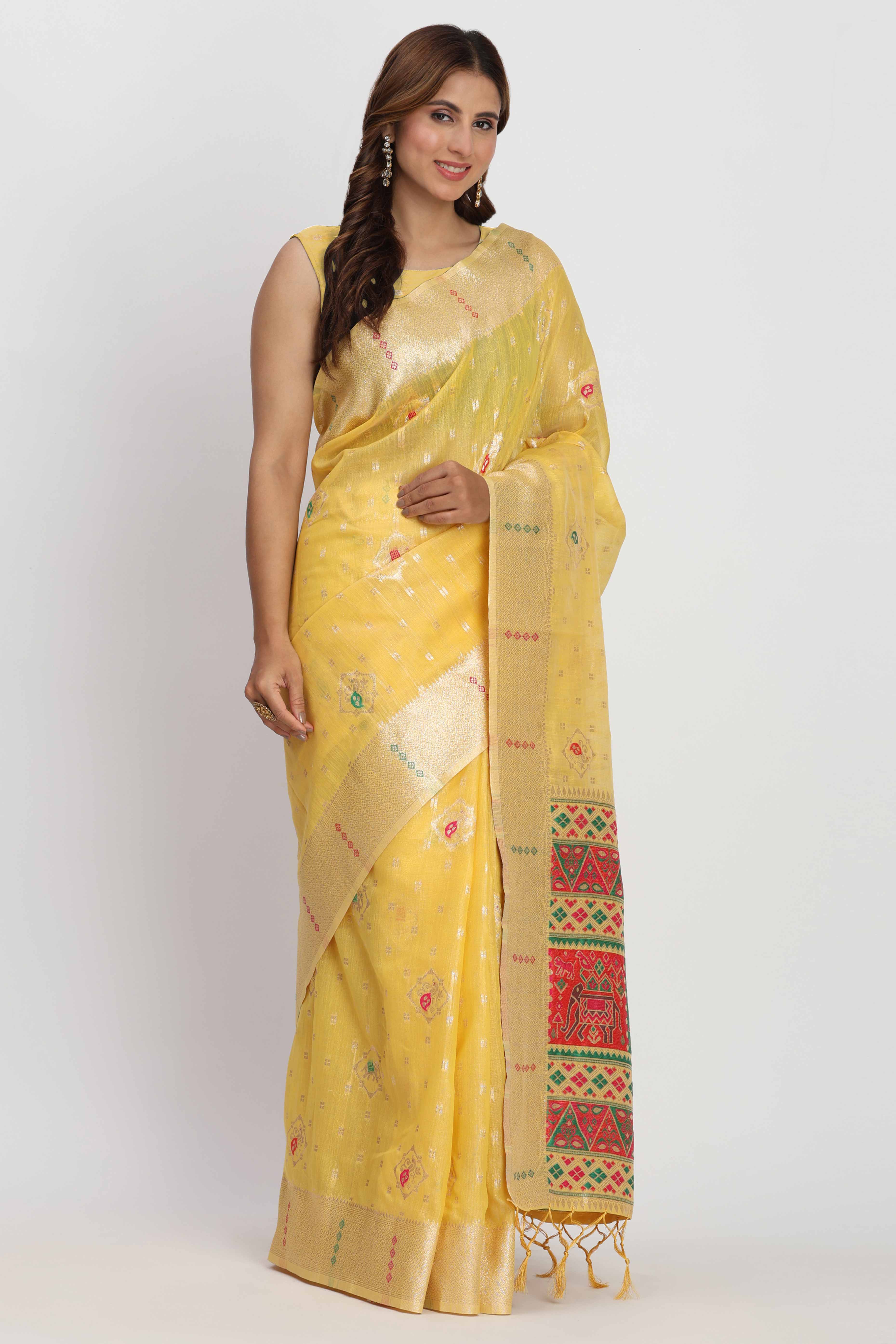 Shimmering Yellow linen Cotton Saree Embellished With Rich Zari Weaving And Tassels Pallu