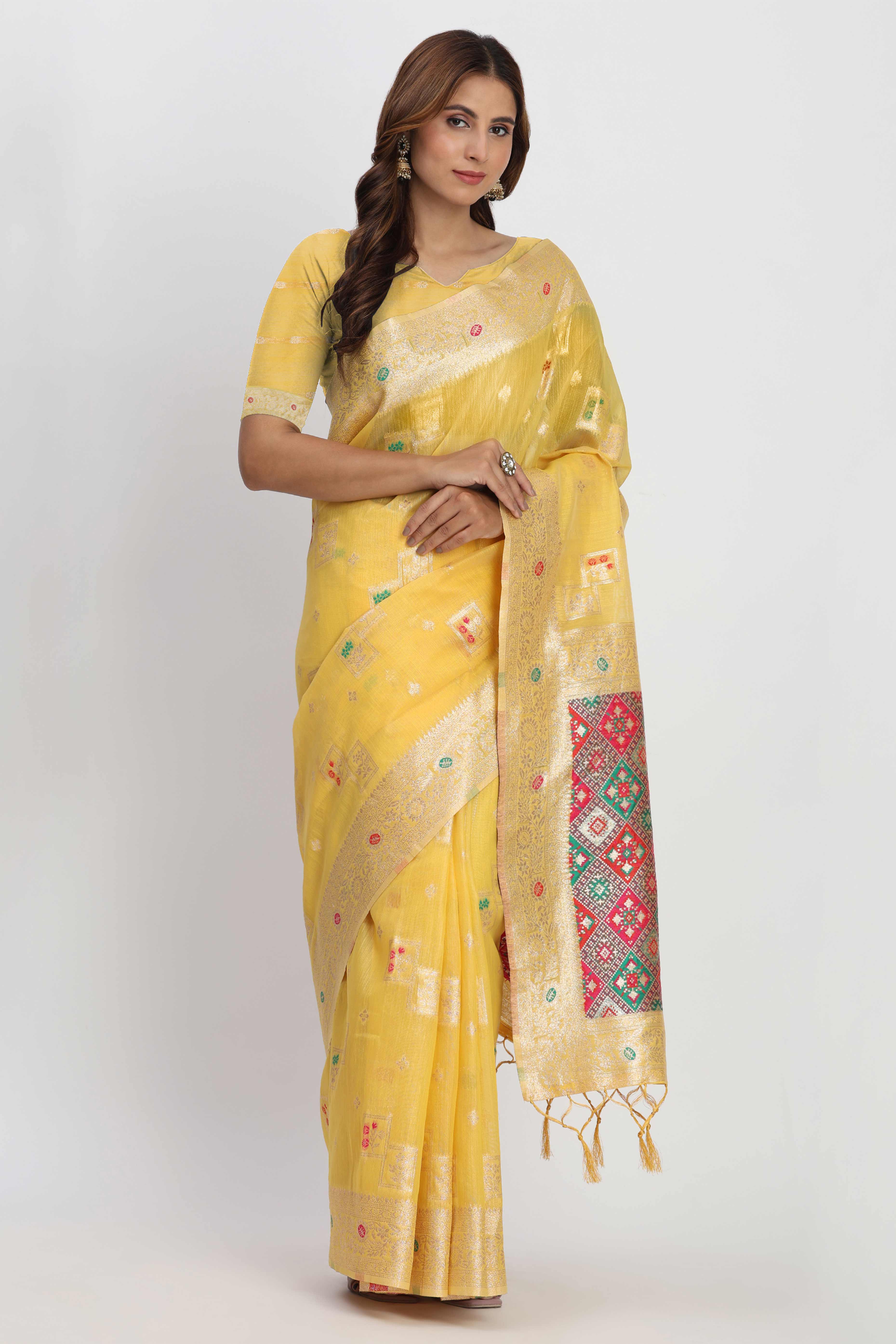 Floral Zari Weaving Brings Regal Beauty To This Yellow Linen Cotton Saree With Tassel Accents