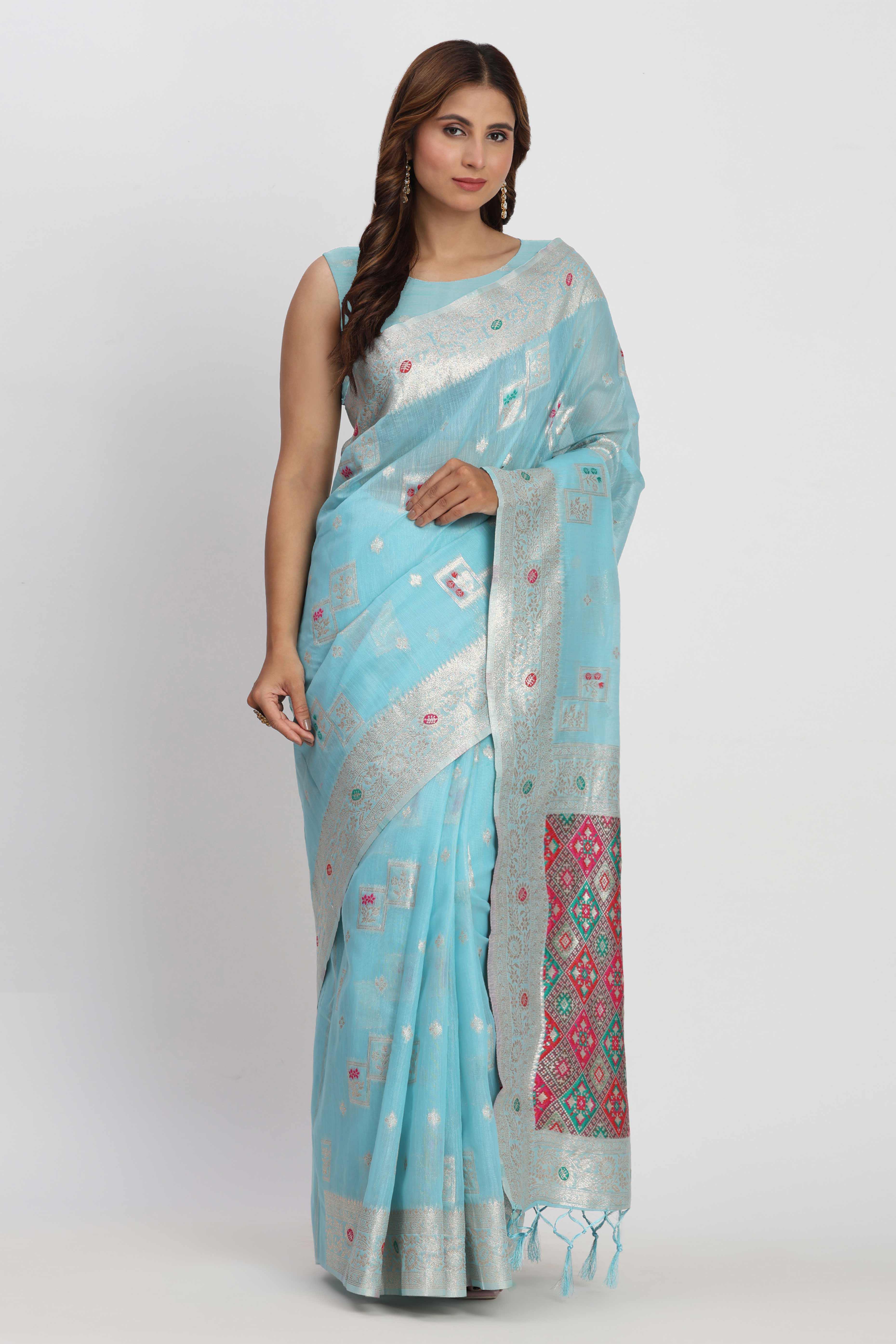 Floral Zari Weaving Brings Regal Beauty To This Sky Blue Linen Cotton Saree With Tassel Accents