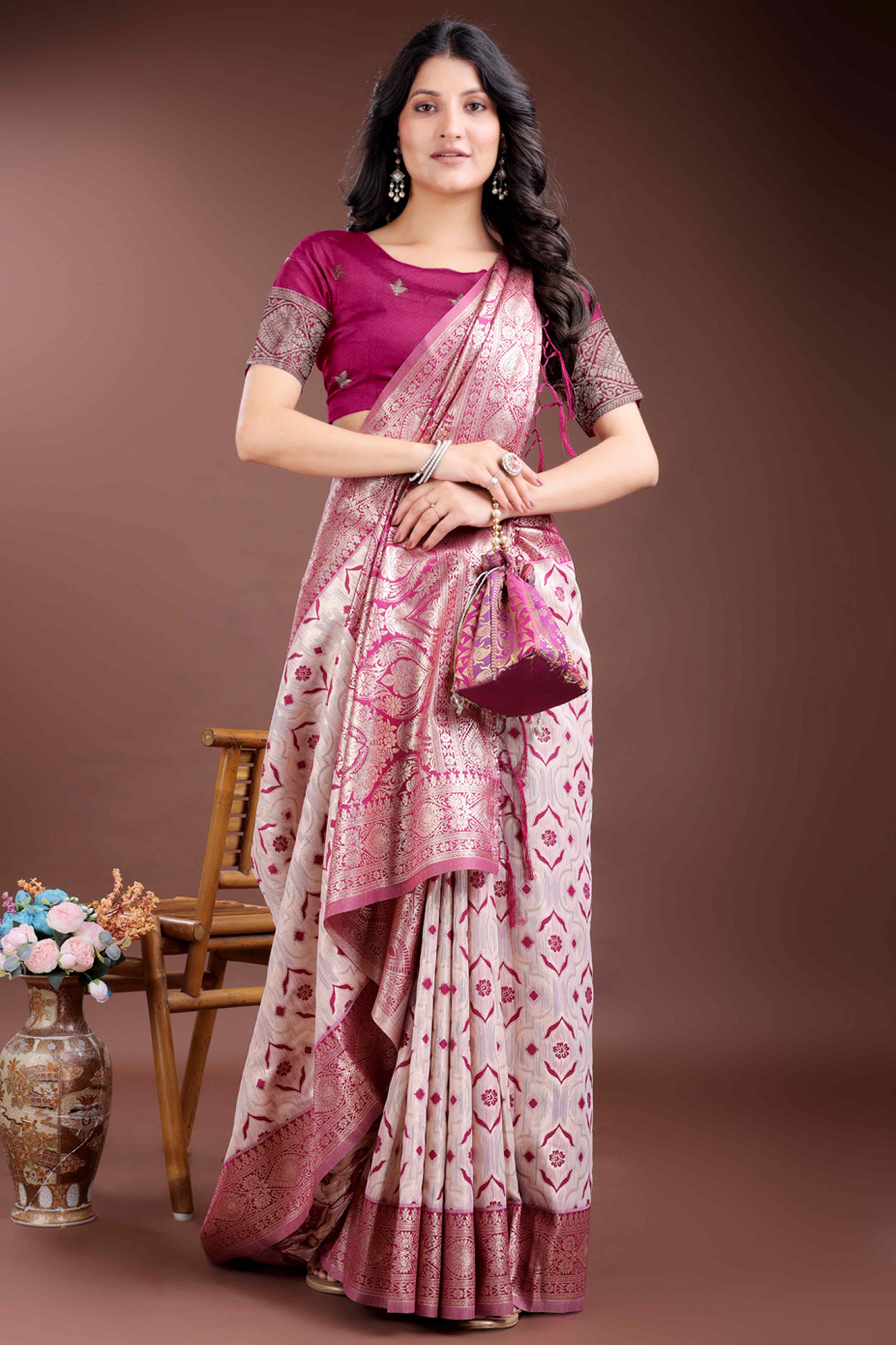 Vibrant Magenta Traditional Ikkat Style Zari Weaving Cotton Blend Saree with Bold Tassel Accents