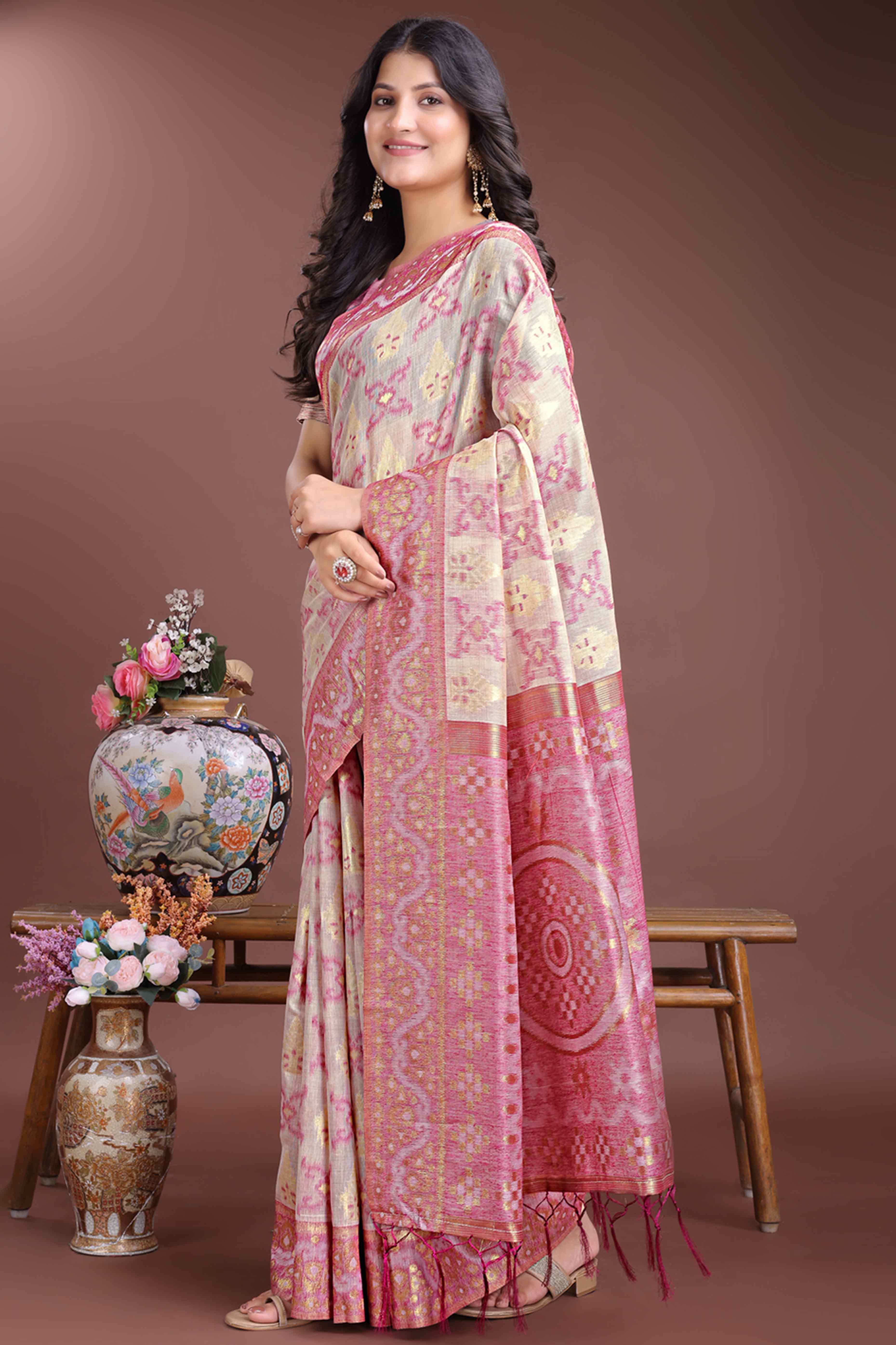 Graceful Pink Traditional Ikkat Style Zari Weaving Cotton Blend Saree with Lovely Tassel Accents