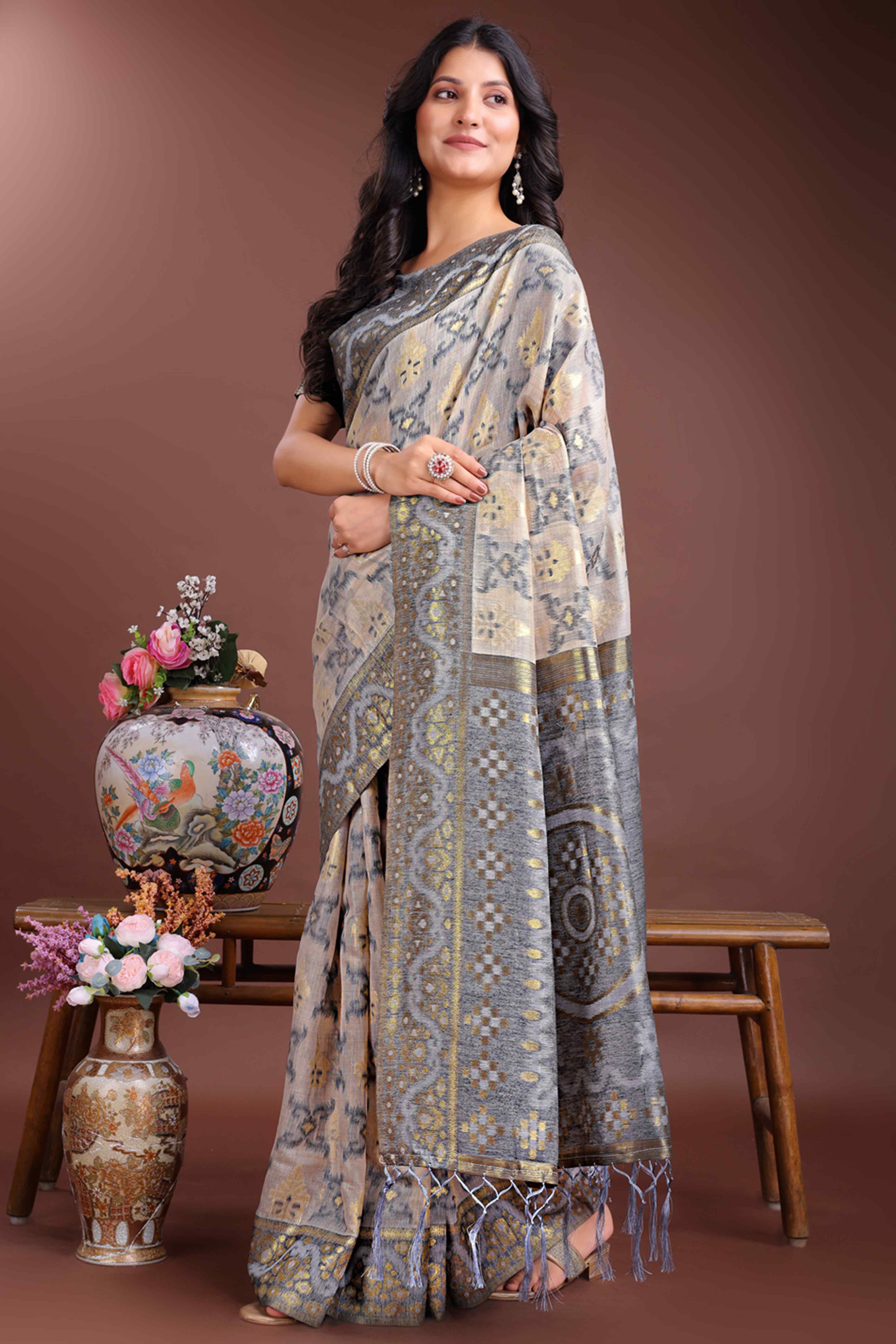 Stylish Grey Traditional Ikkat Style Zari Weaving Cotton Blend Saree with Subtle Tassel Ornaments