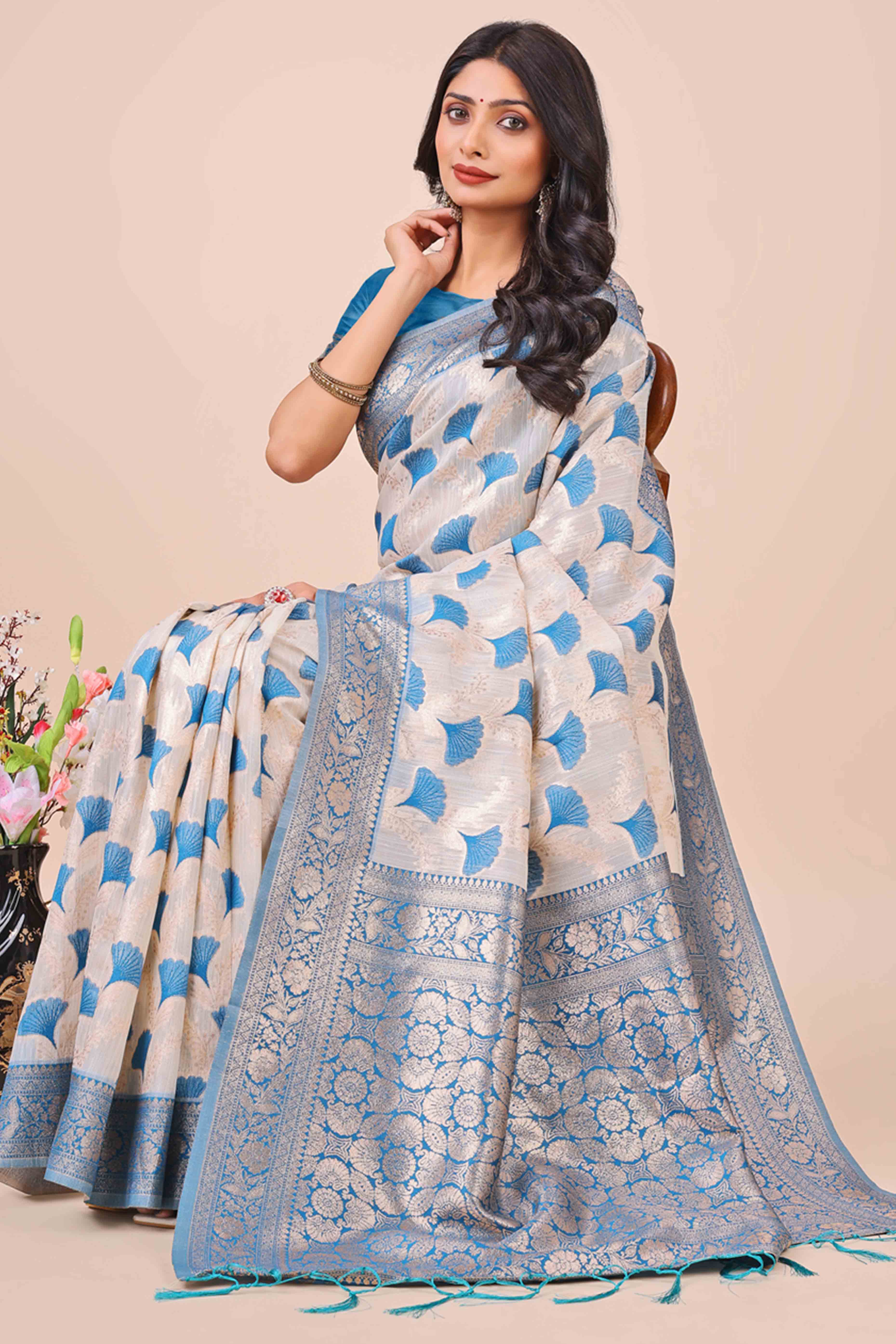 Blue Saree In Linen Cotton With Beautiful Floral Woven Patterns & a Tassel