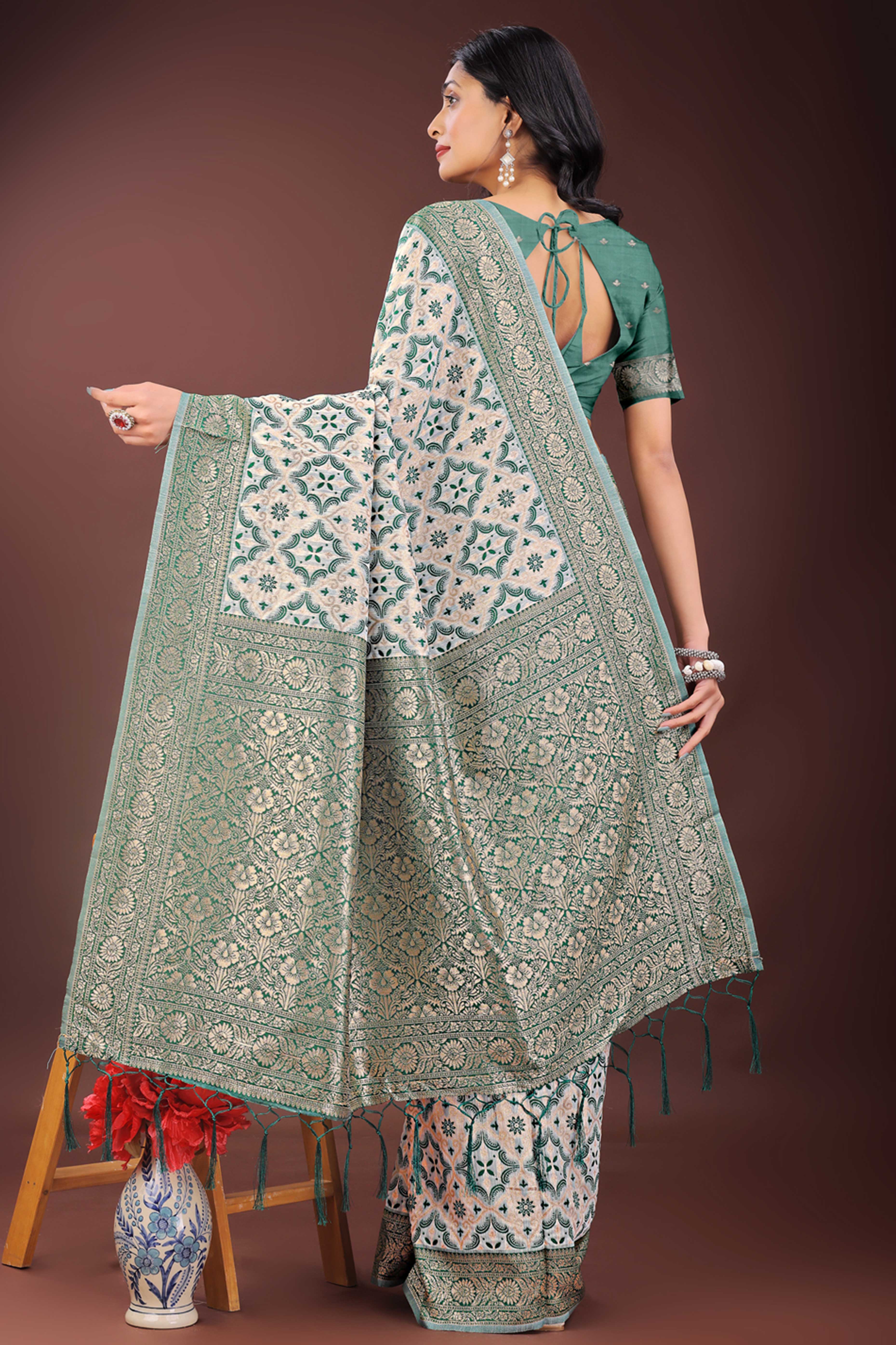 Green Cotton Blend Saree with Woven Floral Brocade Patterns and Tasseled Borders
