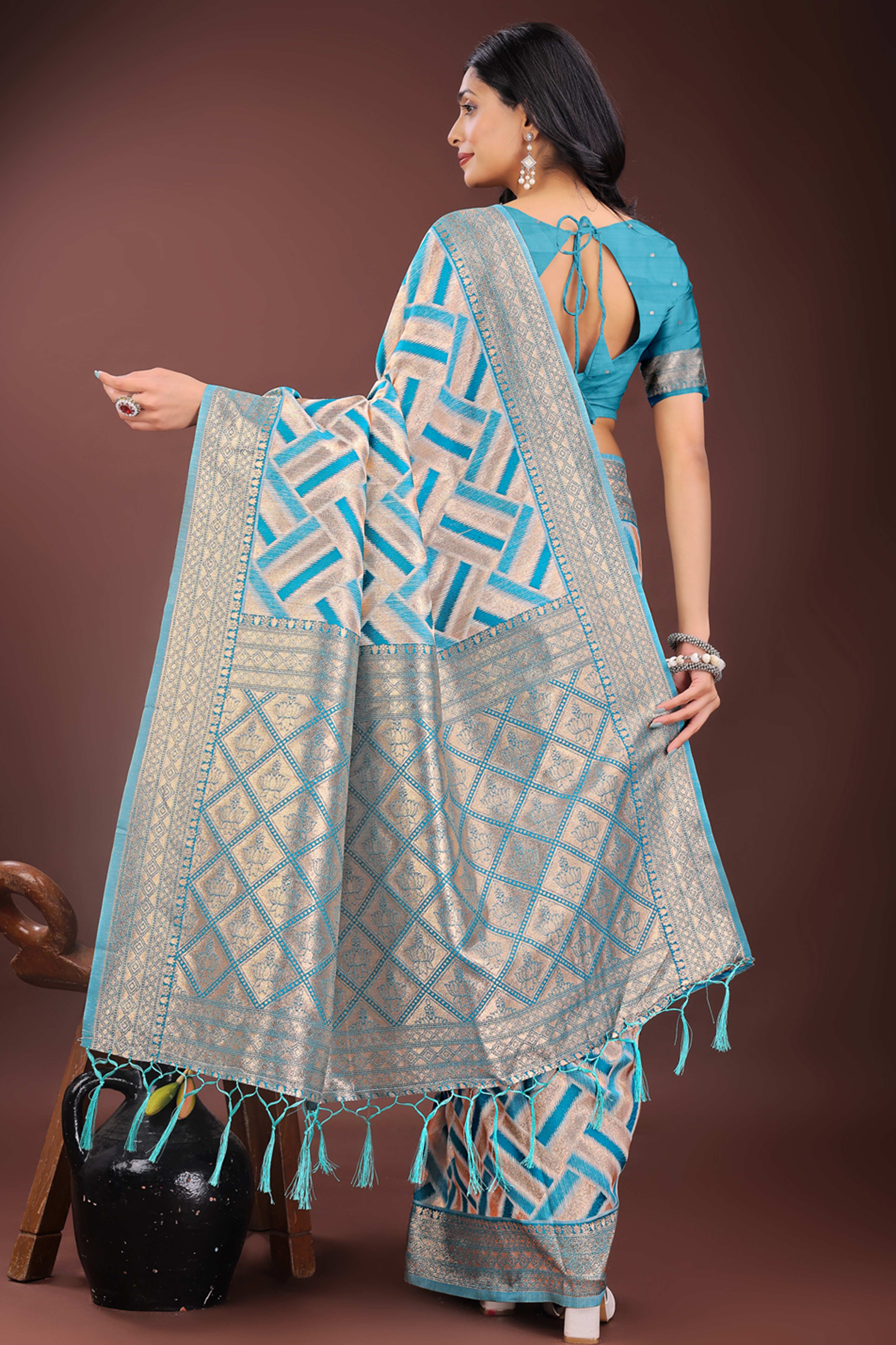 Teal Saree with Zari Woven Geometric Motifs and Graceful Tassel Accents