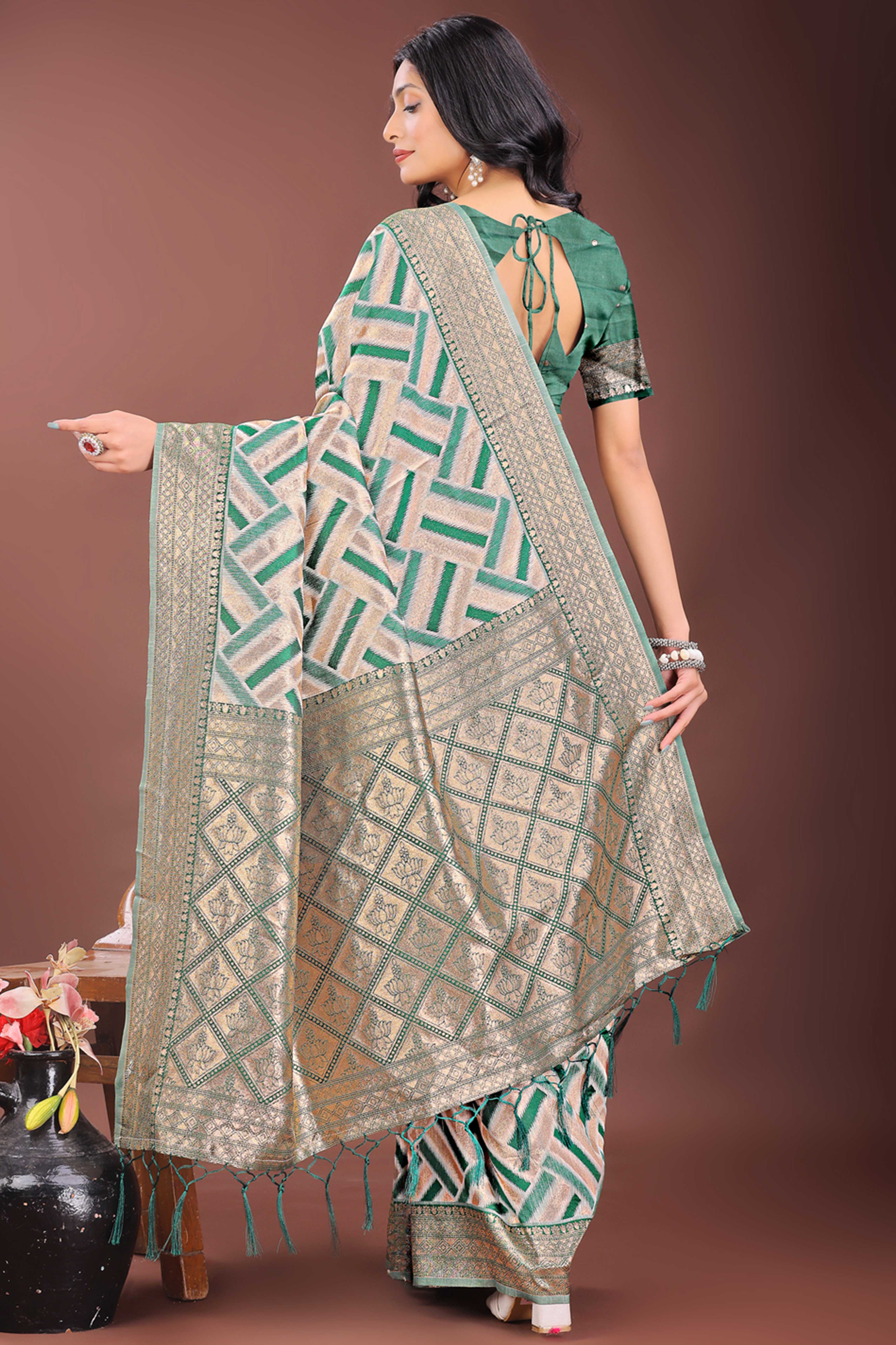 Green Saree with Zari Woven Geometric Motifs and Graceful Tassel Accents
