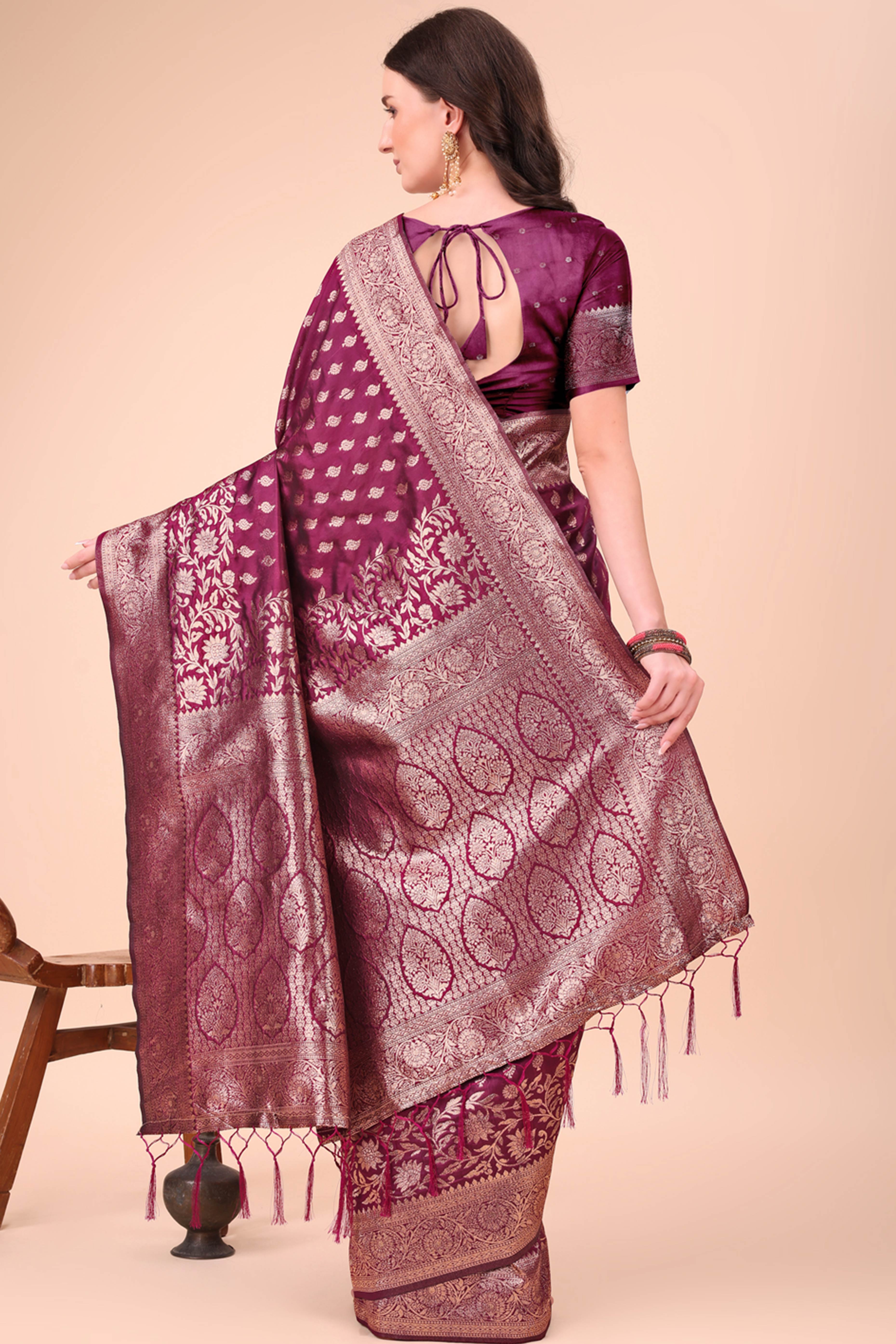 Wine Saree In Lichi Silk Blend With Floral Zari Weaving & Delicate Tassel Border