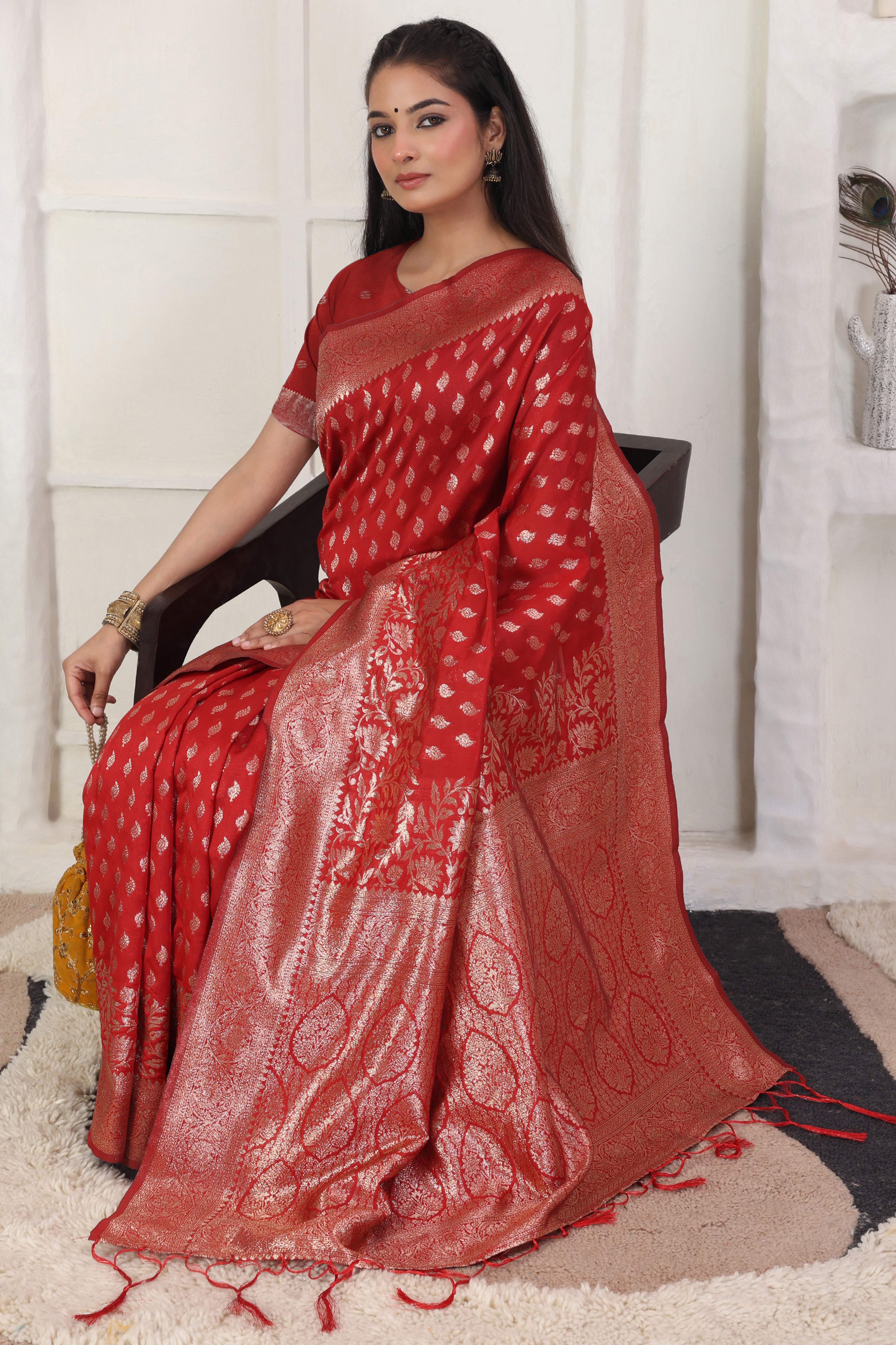 Red Traditional Lichi Silk Blend Saree Enhanced With Floral Zari Weaving & Tassel Pallu